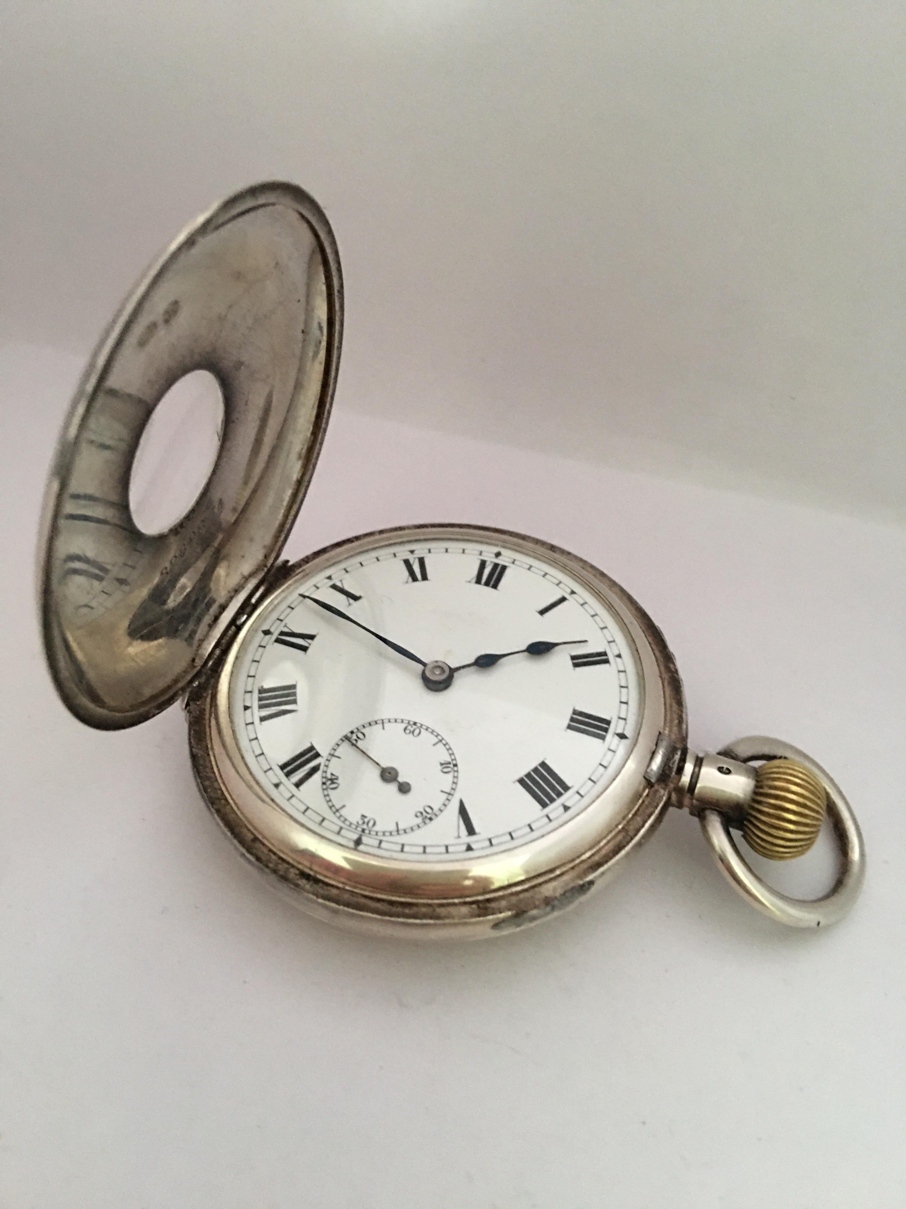 winding a pocket watch