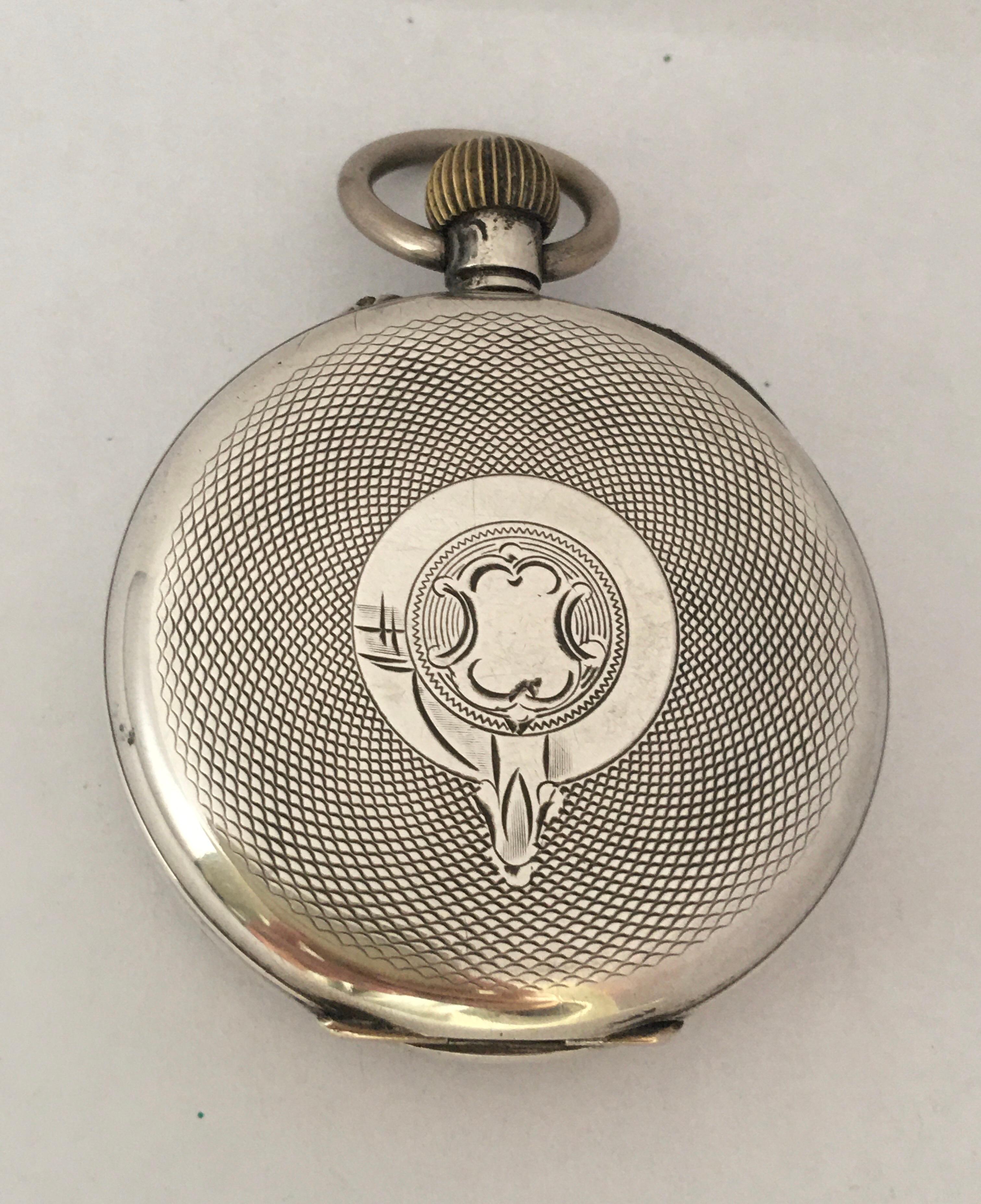 This beautiful antique hand winding silver pocket watch is in good working condition and it is ticking well. It is a pin set time setting. Visible signs of ageing and wear with small light scratches on the glass and on the silver watch case. small