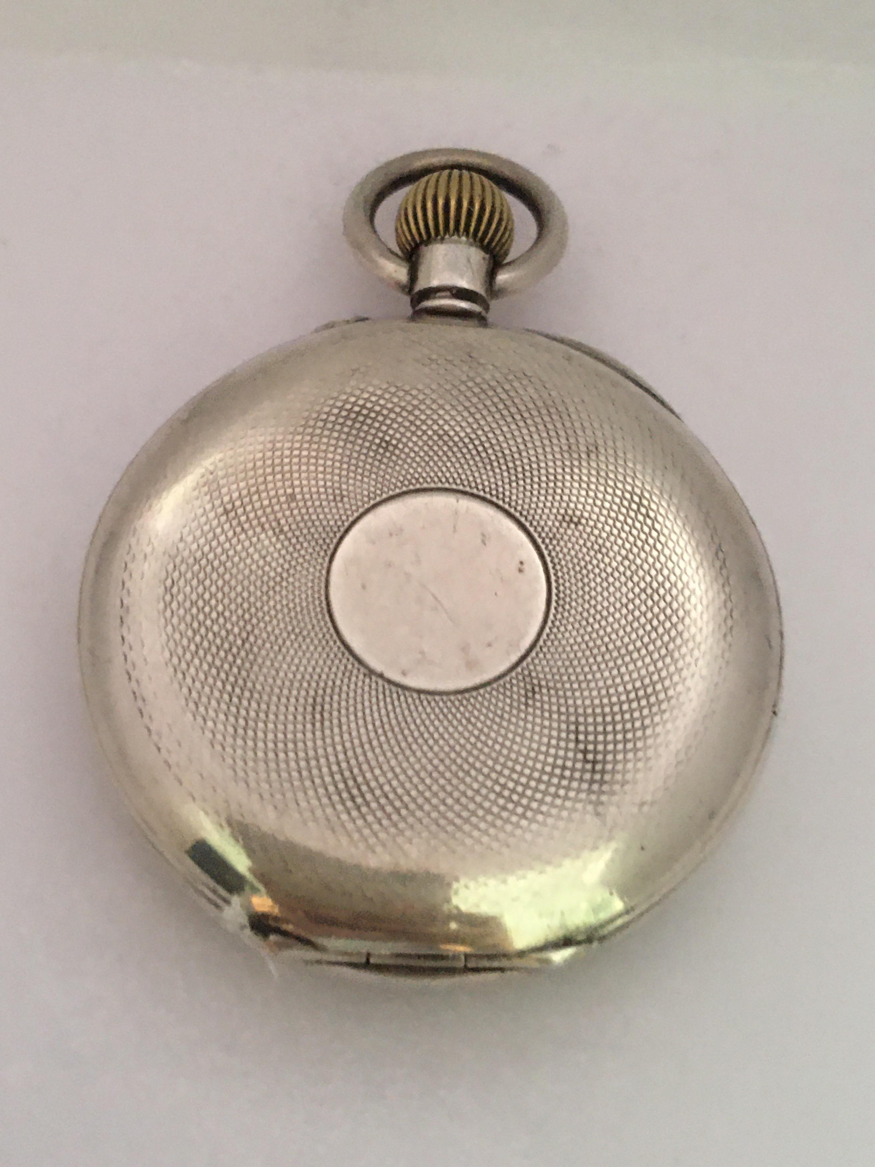 This beautiful 46mm diameter ( excluding crown) antique hand winding silver pocket watch is in good working condition and it is ticking well. It is recently been serviced and it runs well. Visible signs of ageing and wear with light scratches on the