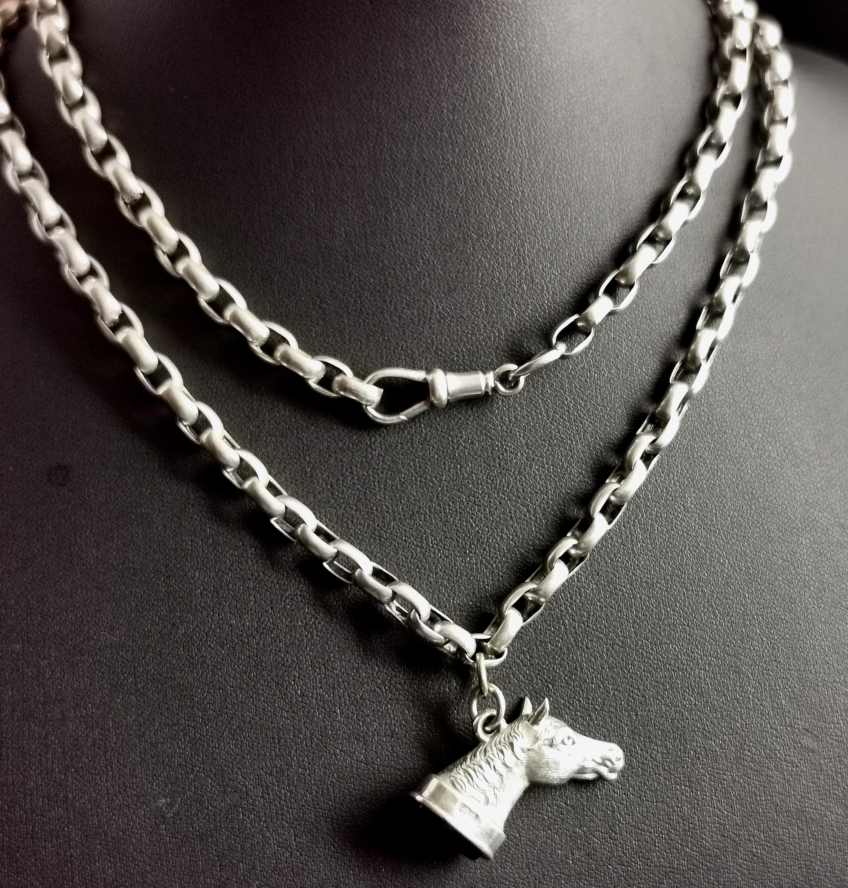 A beautiful antique, late Victorian era sterling silver long belcher link chain necklace with a silver horse head and bloodstone seal fob pendant.

Paired together this makes the most amazing antique necklace, attractive chunky oval belcher links