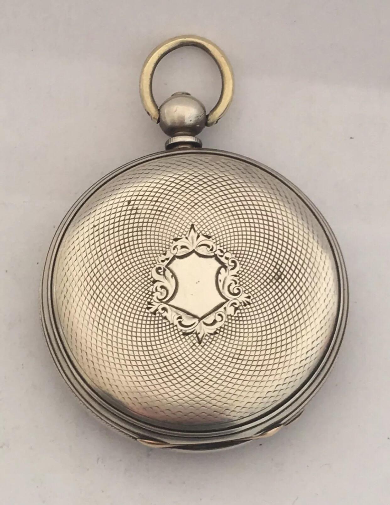 Antique Silver Decorative Gold And Silver Enlaid Dial Pocket Watch. This watch is in good working condition and is ticking well it signed by Henry Touchon. c.1880


The metal ring or loop is different colour to the watch itself.