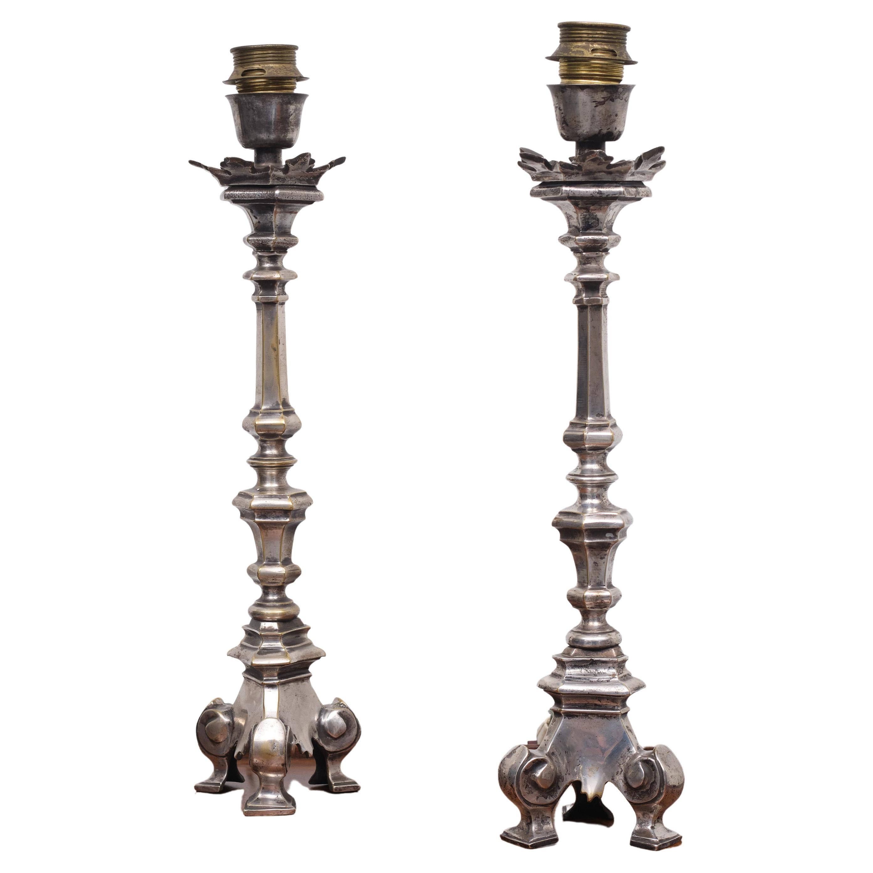 Superb set off Italian Rococo Altar candlesticks. Silver plated. 19 century 
Before they where lamp stands, they where candlesticks. with on top a 
Large pin for the candles. silver plated .the measurements are without the 
shade.