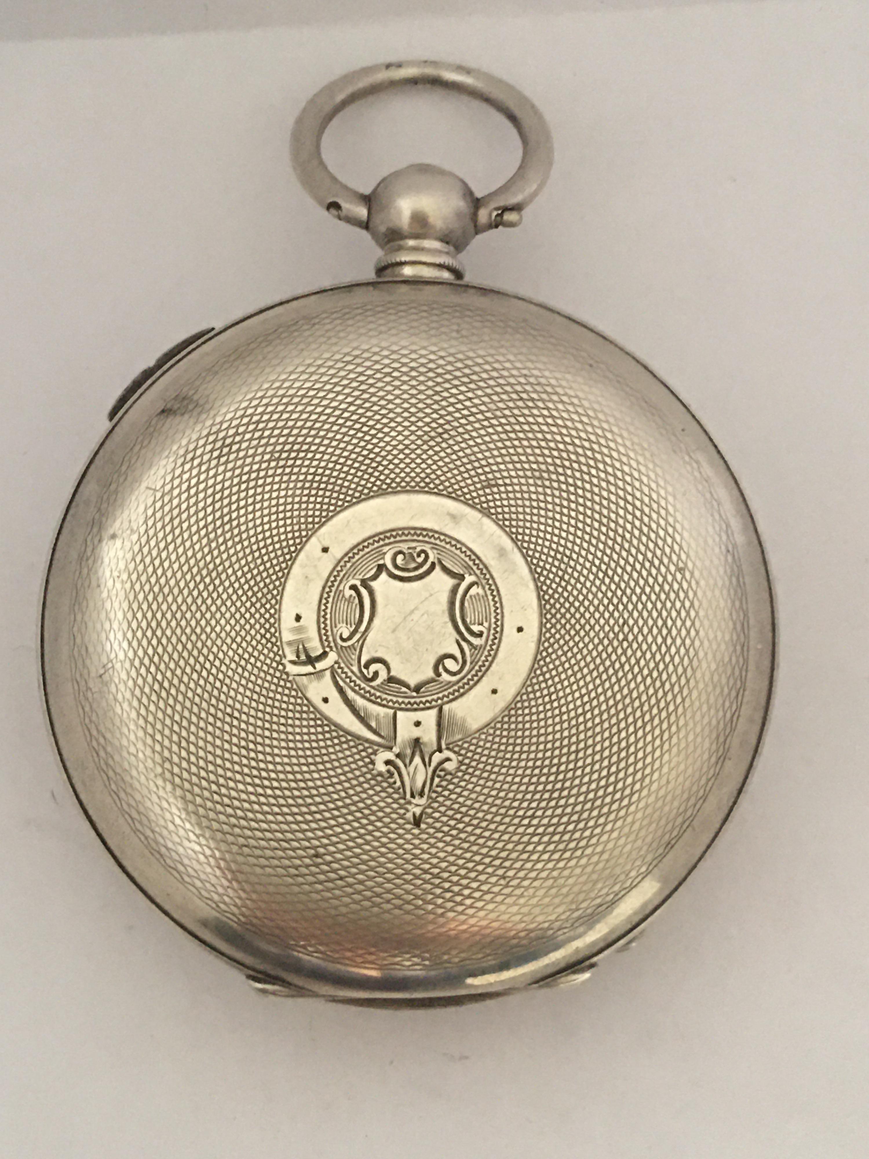 This Charming Antique Silver pocket watch with a stop watch mechanism is working and it is ticking well. And it comes with a key

Please study the images carefully as form part of the description.