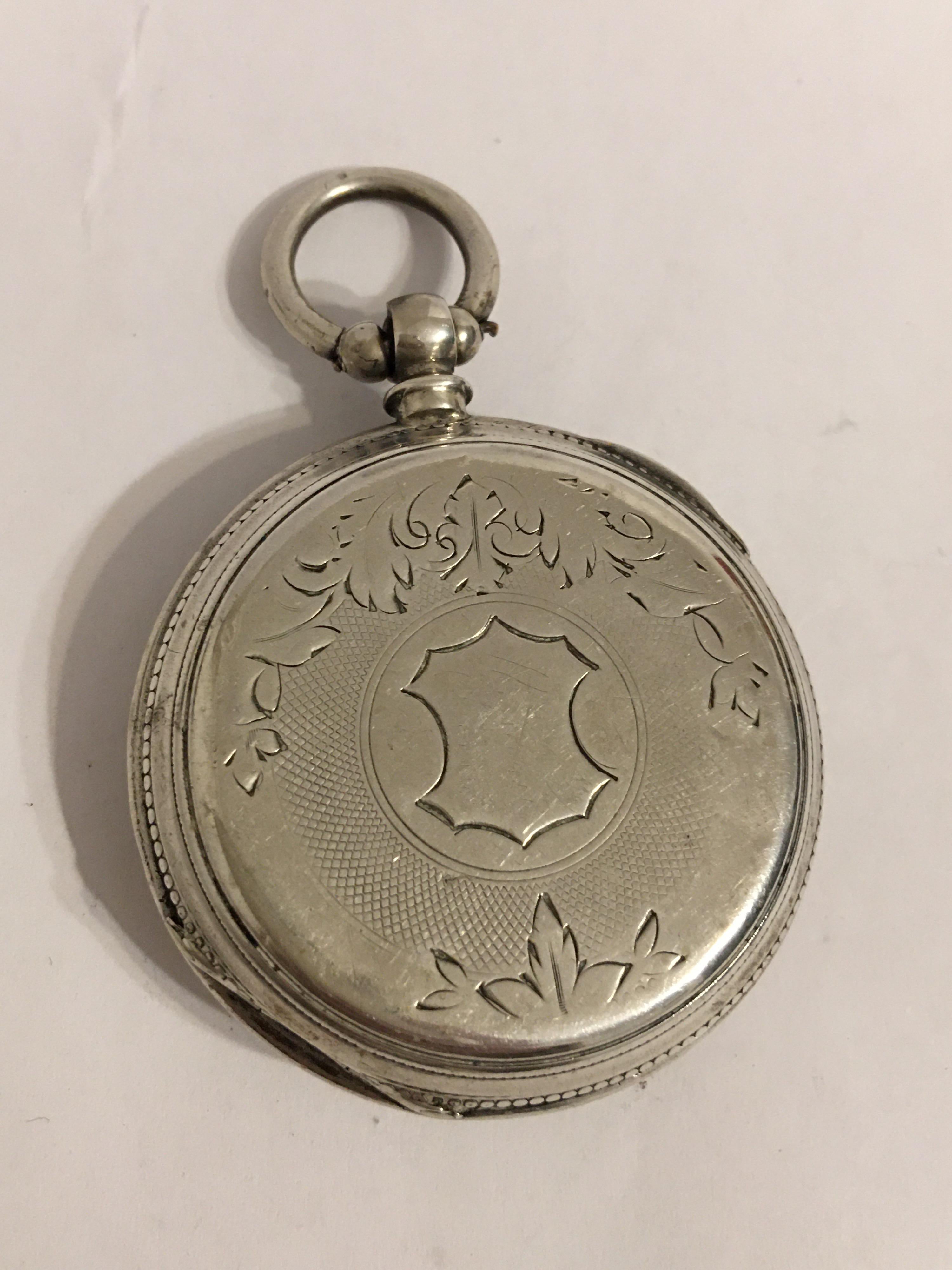 This stunning key-wind silver pocket watch is working and is ticking well. It comes with a key. Visible cracks and chipped on the dial as shown. 

Please study the images carefully as form part of the description.

