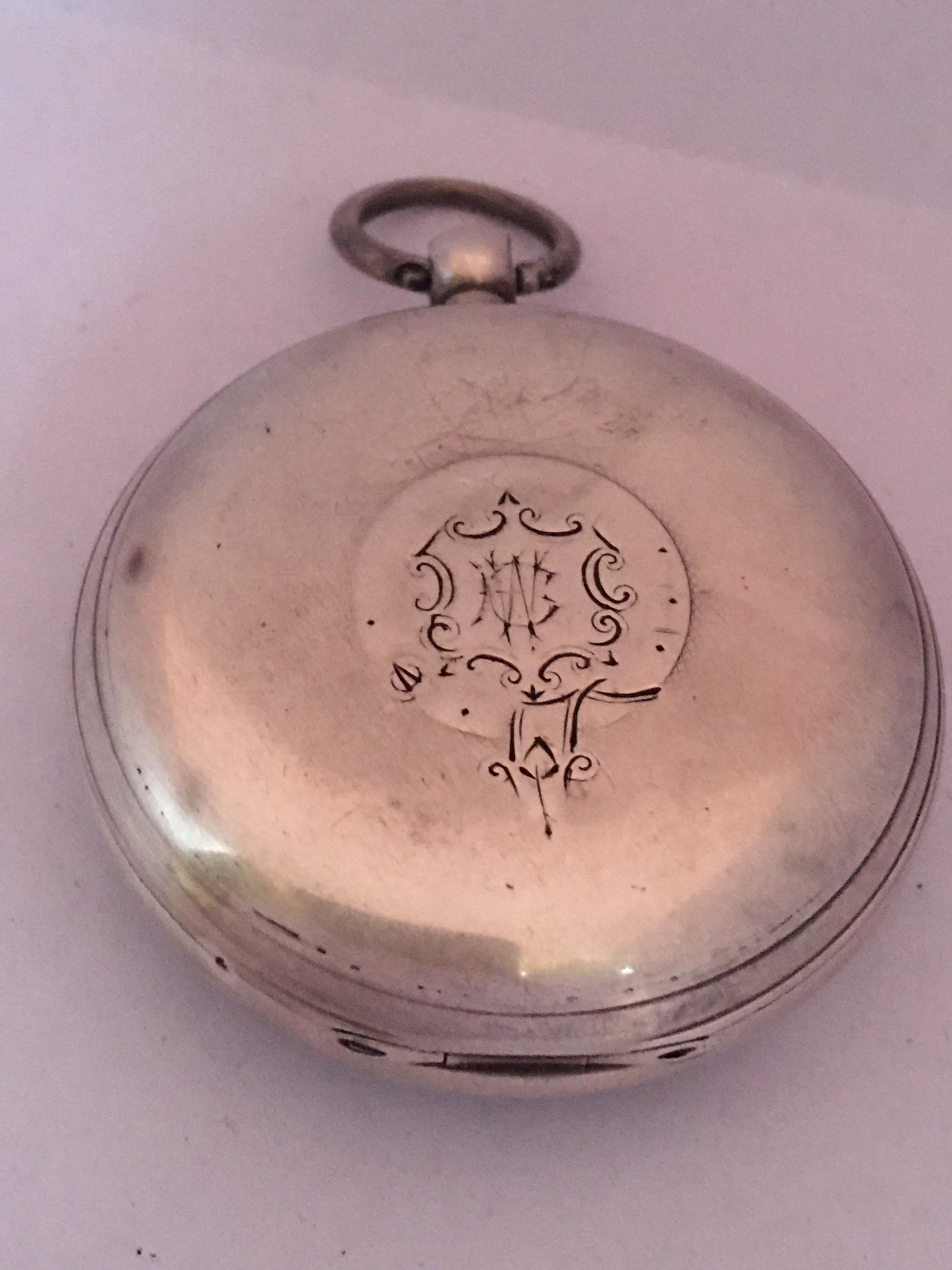 This beautiful antique key winding silver pocket watch is in good working condition and it is running well. Visible signs of ageing and wear with light scratches on the glass and on the watch case as shown. Some tiny dents on the watch case as