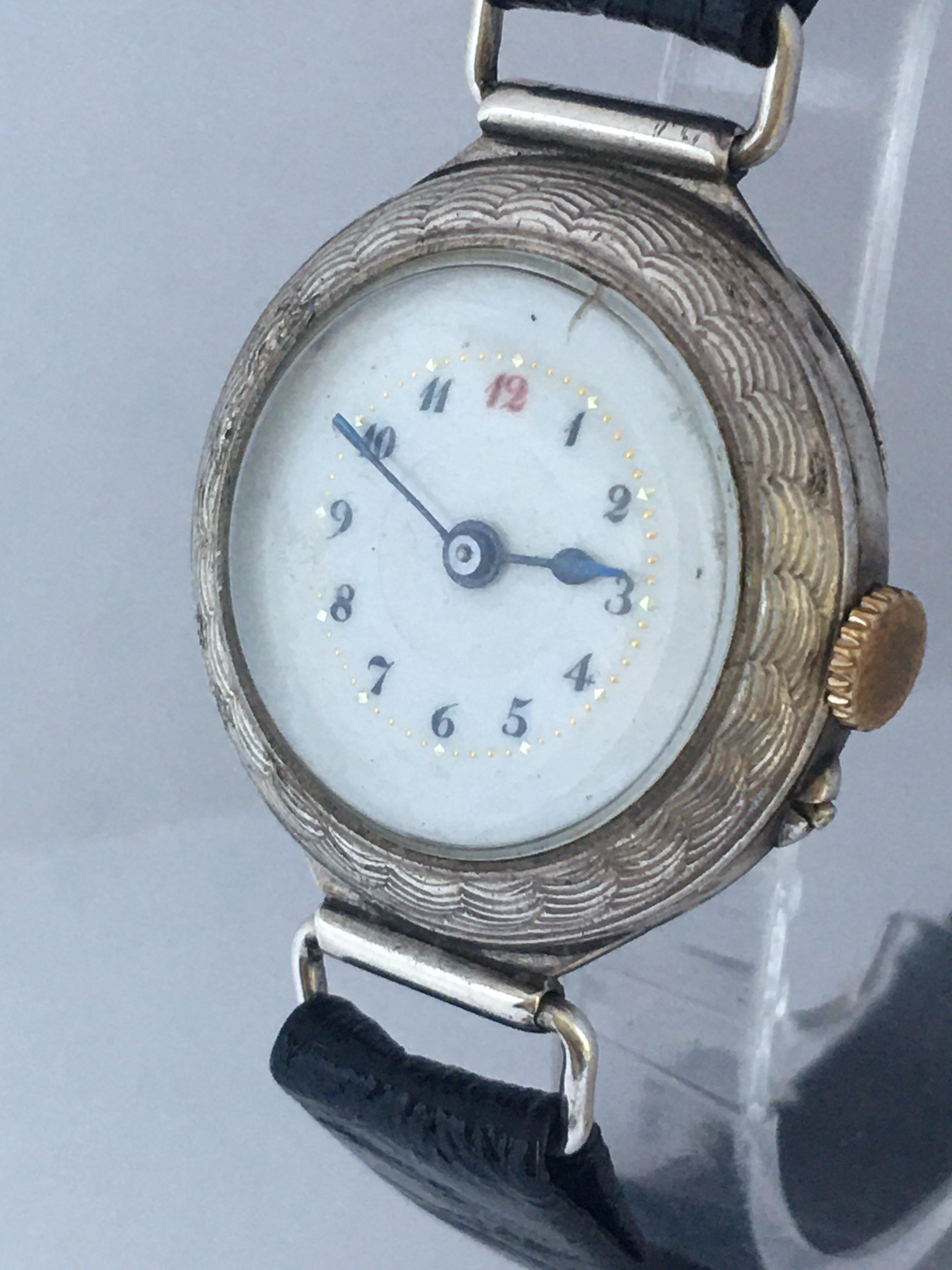 This beautiful antique hand winding pin setting Ladies Trench watch is working and it is ticking well, but I cannot guarantee the time accuracy. Visible signs of ageing and wear with tiny crack on the glass between 12 o’clock and 1 o’clock as shown.