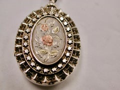 Antique Silver Locket With Applied Two Colour Goldwork On Antique Silver Chain