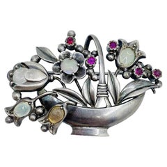 Antique Silver Moonstone and Ruby Flower Basket Brooch