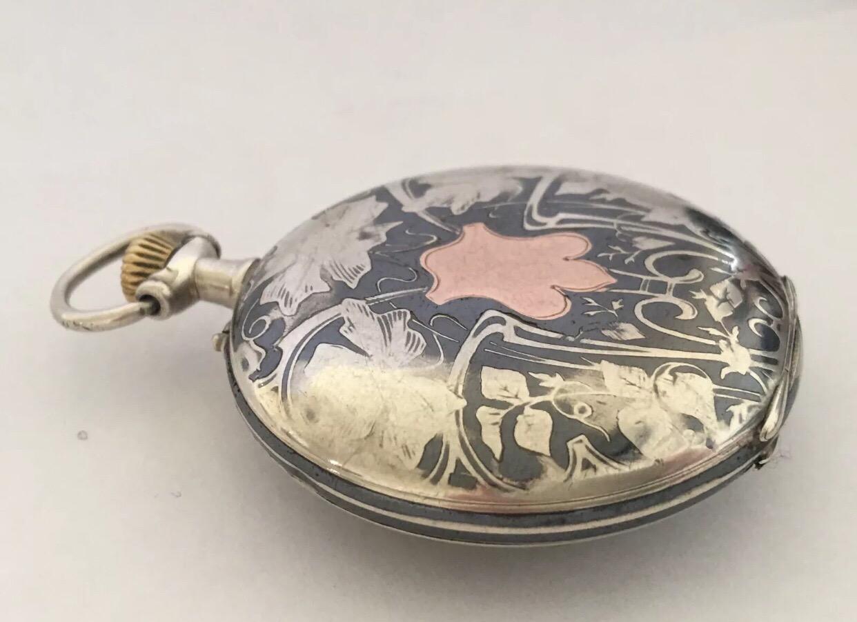 Montre de poche ancienne à boîtier en argent niellé gravé en vente 6