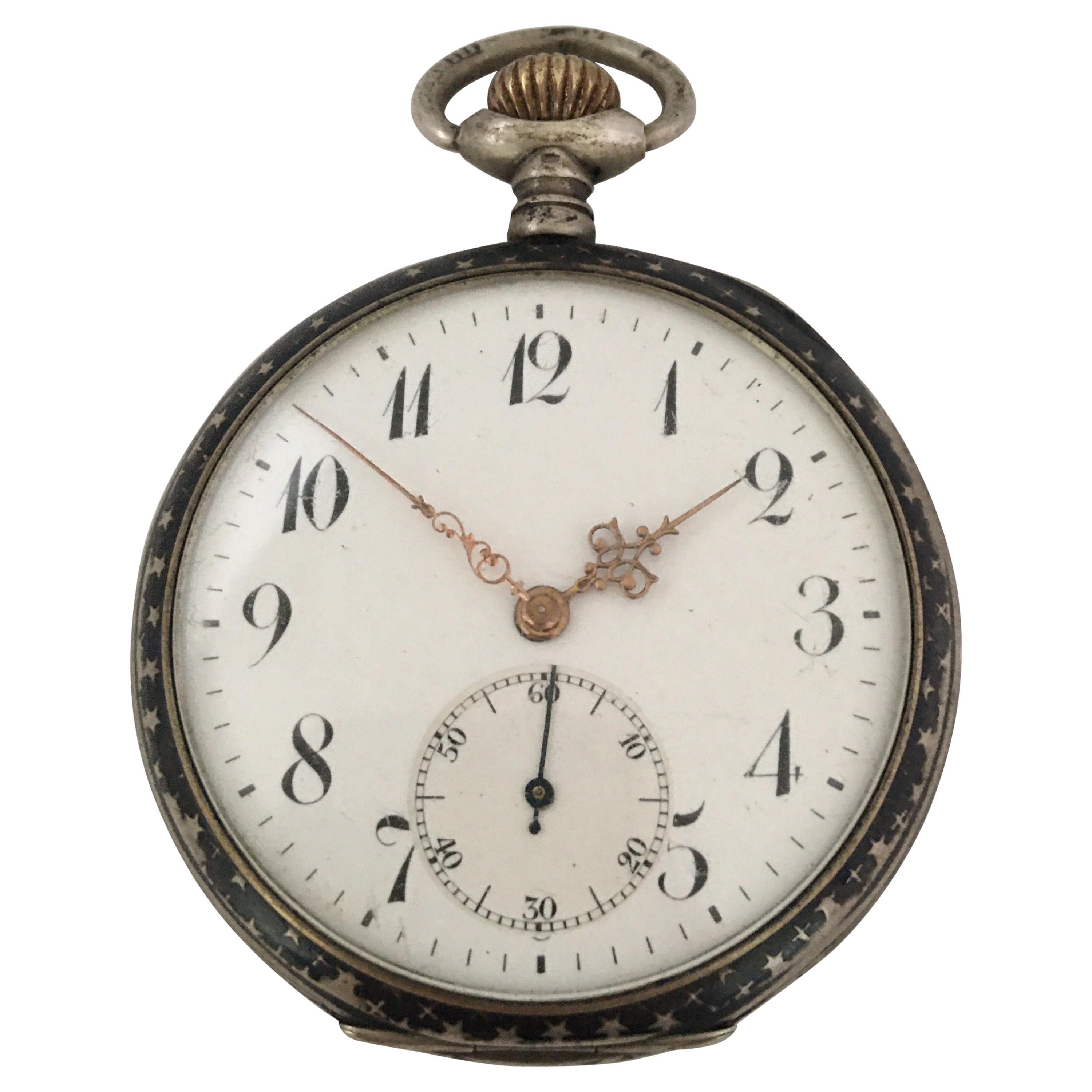 This beautiful 50mm diameter Keyless stem-winding good quality pocket watch is in good working condition and it is running well. Visible signs of ageing and wear with light surface marks on the glass and on the watch case as shown. the case has