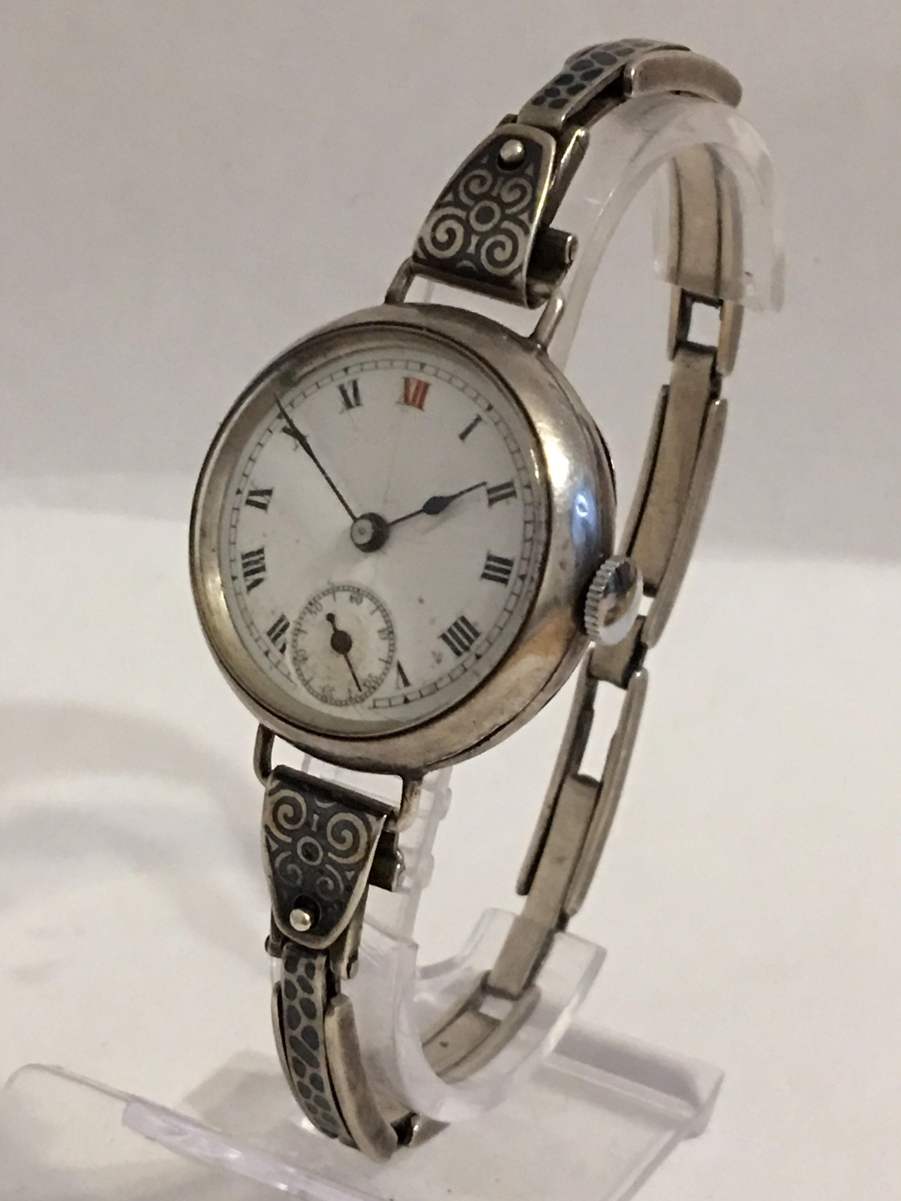 This beautiful mechanical Antique Swiss Trench watch is working and is ticking well. Visible cracks & scratches on the enamel dial, few scratches on the top glass. And also there is few dents and scratches on the back case cover. 
