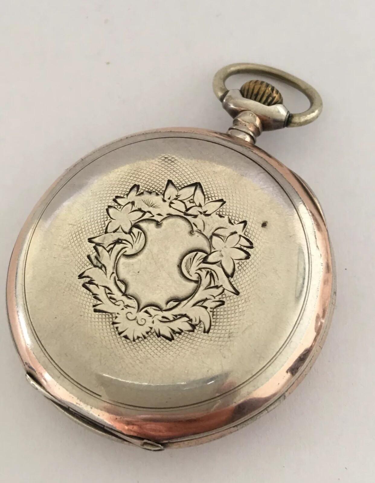 Antique Silver Omega Pocket Watch.

This watch is working and running well. Visible cracks and chipped on the dial as shown on the photo. Watch case a bit tarnished.