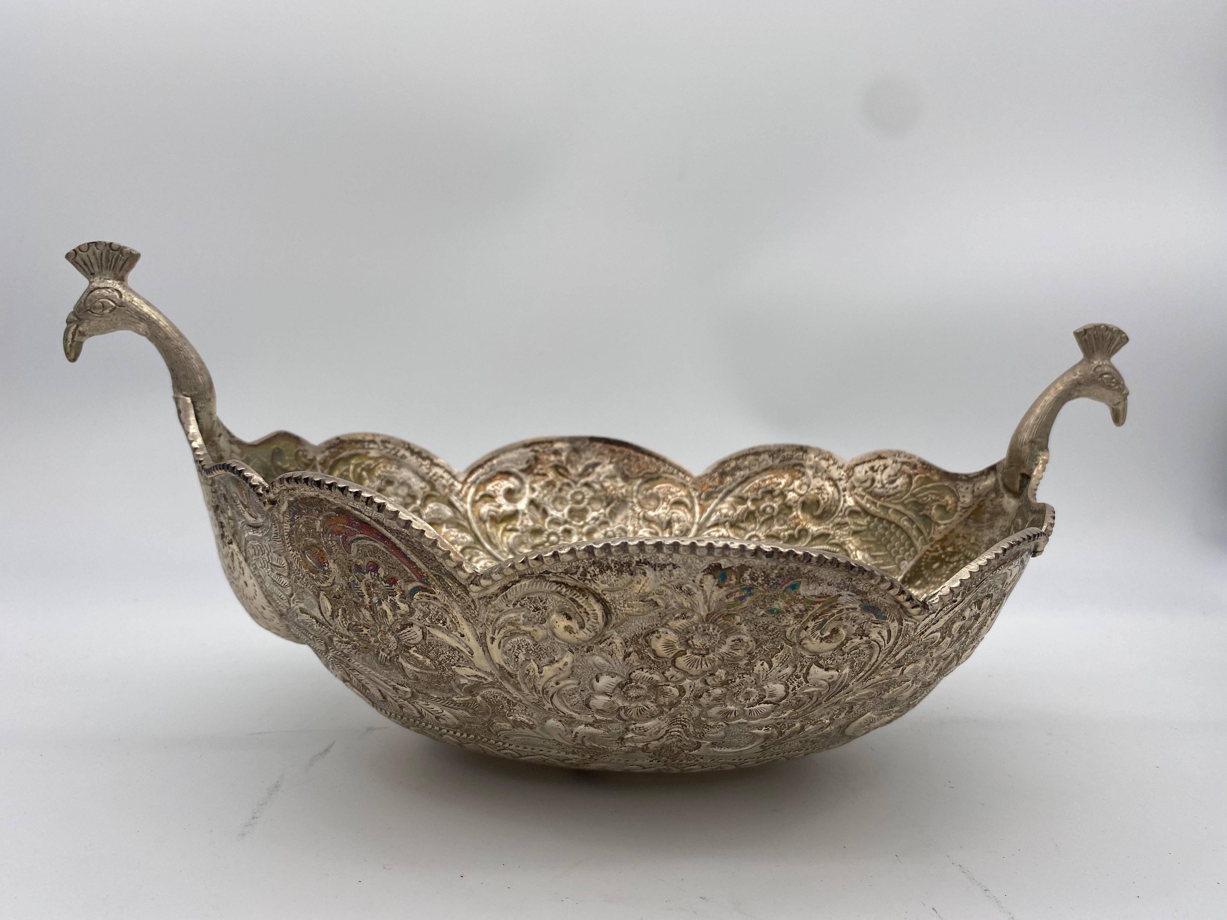 Antique silver oval serving bowl with peacock handles. Weighs 816 grams.
