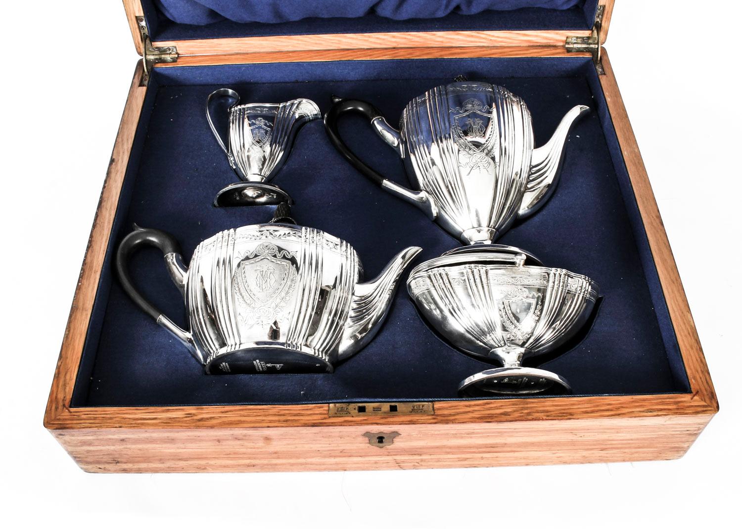 An exquisite antique English Victorian silver plate cased tea set, with the makers mark of the renowned silversmith Walker & Hall, Sheffield, circa 1860 in date.
 
This rare complete set is in superb condition in the neoclassical style and