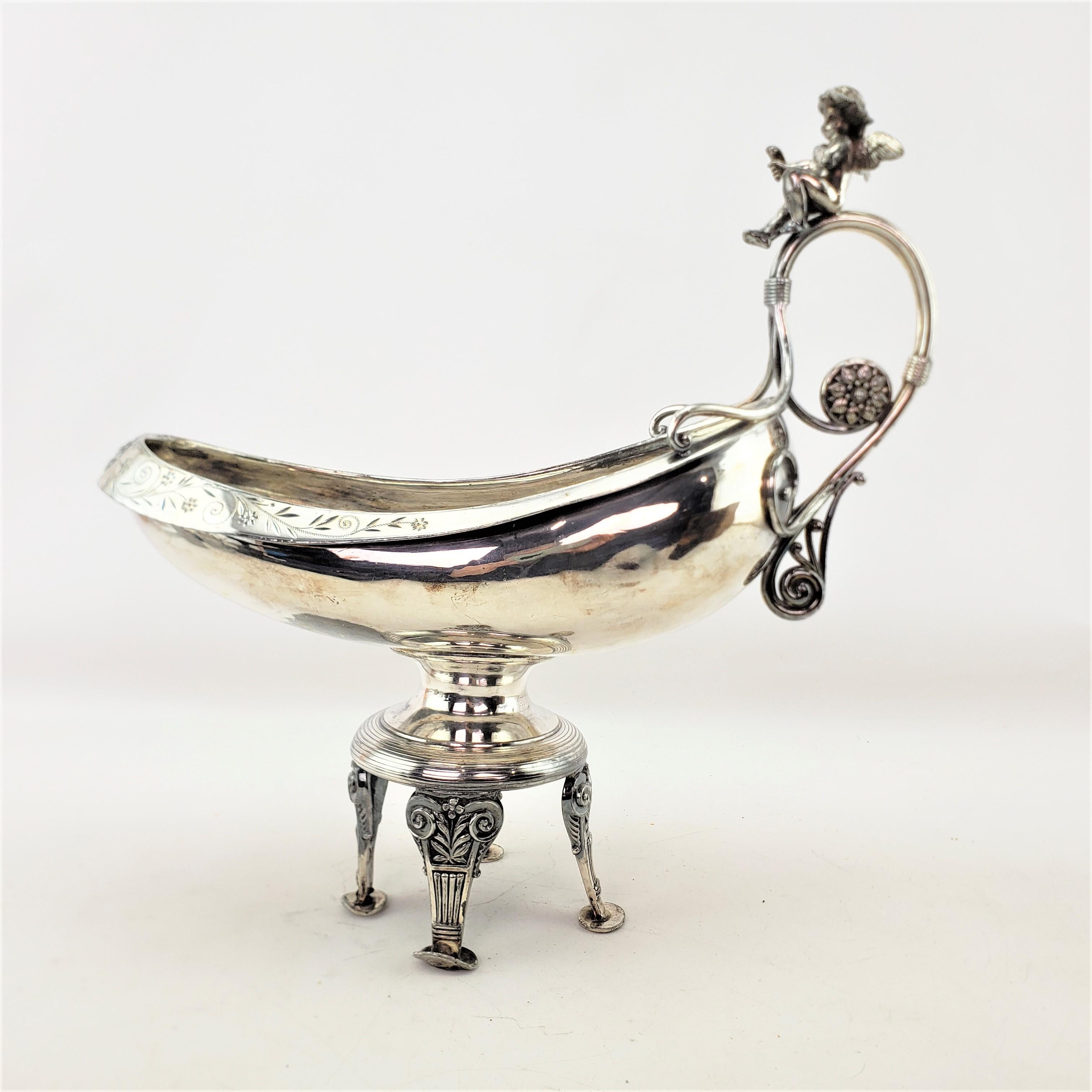 This antique centerpiece pedestal bowl is signed by an unidentified maker, but believed to have originated from the United States and date to approximately 1900 and done in a Victorian style. The centerpiece is composed of silver plate and features