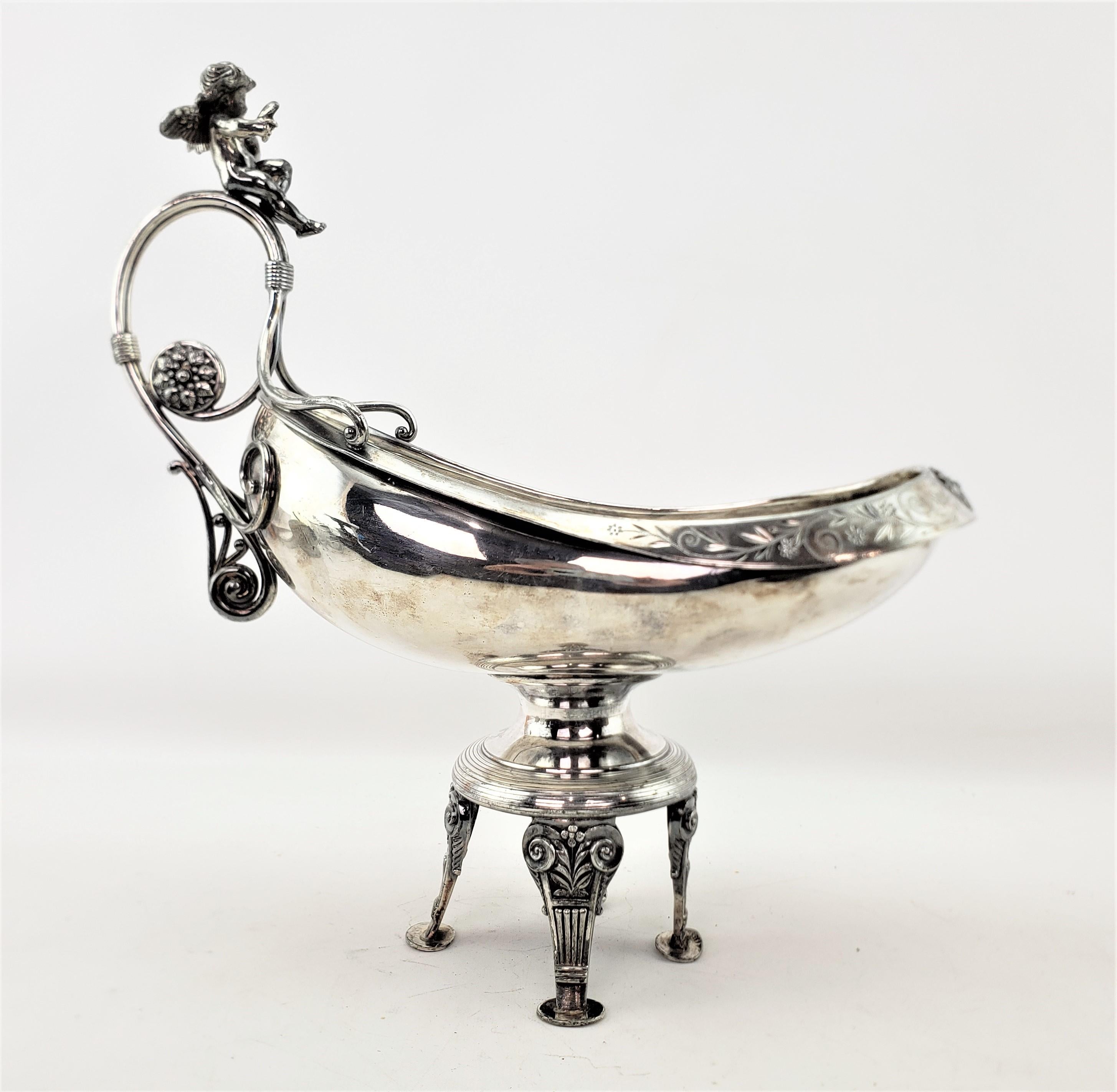 Machine-Made Antique Silver Plated Centerpiece Bowl with Figural Cherub & Floral Engraving For Sale