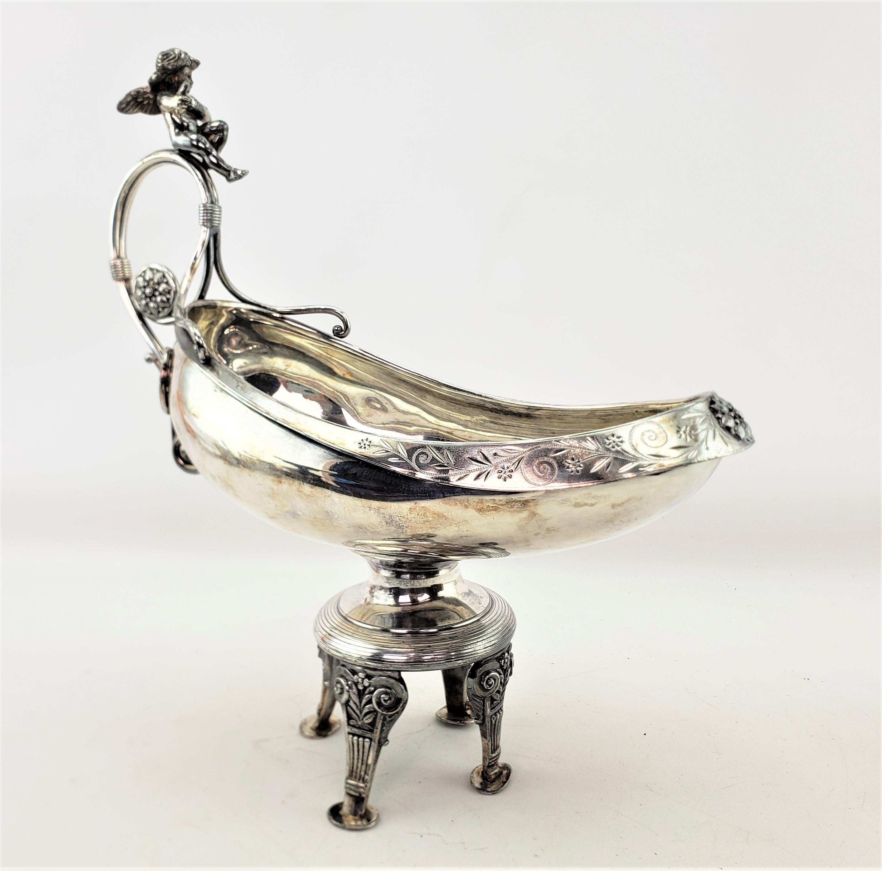 20th Century Antique Silver Plated Centerpiece Bowl with Figural Cherub & Floral Engraving For Sale