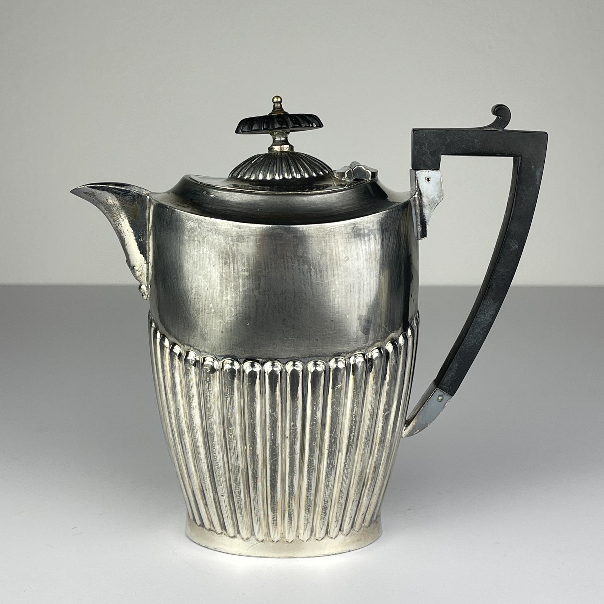 Antique silver plated coffee pot made in Sheffield, England in the 1890-1910s.
Silver plated is used to denote - the method was invented in the city of Sheffield in about 1743 by goldsmith Thomas Boulsover.
Objects made with the metal obtained by