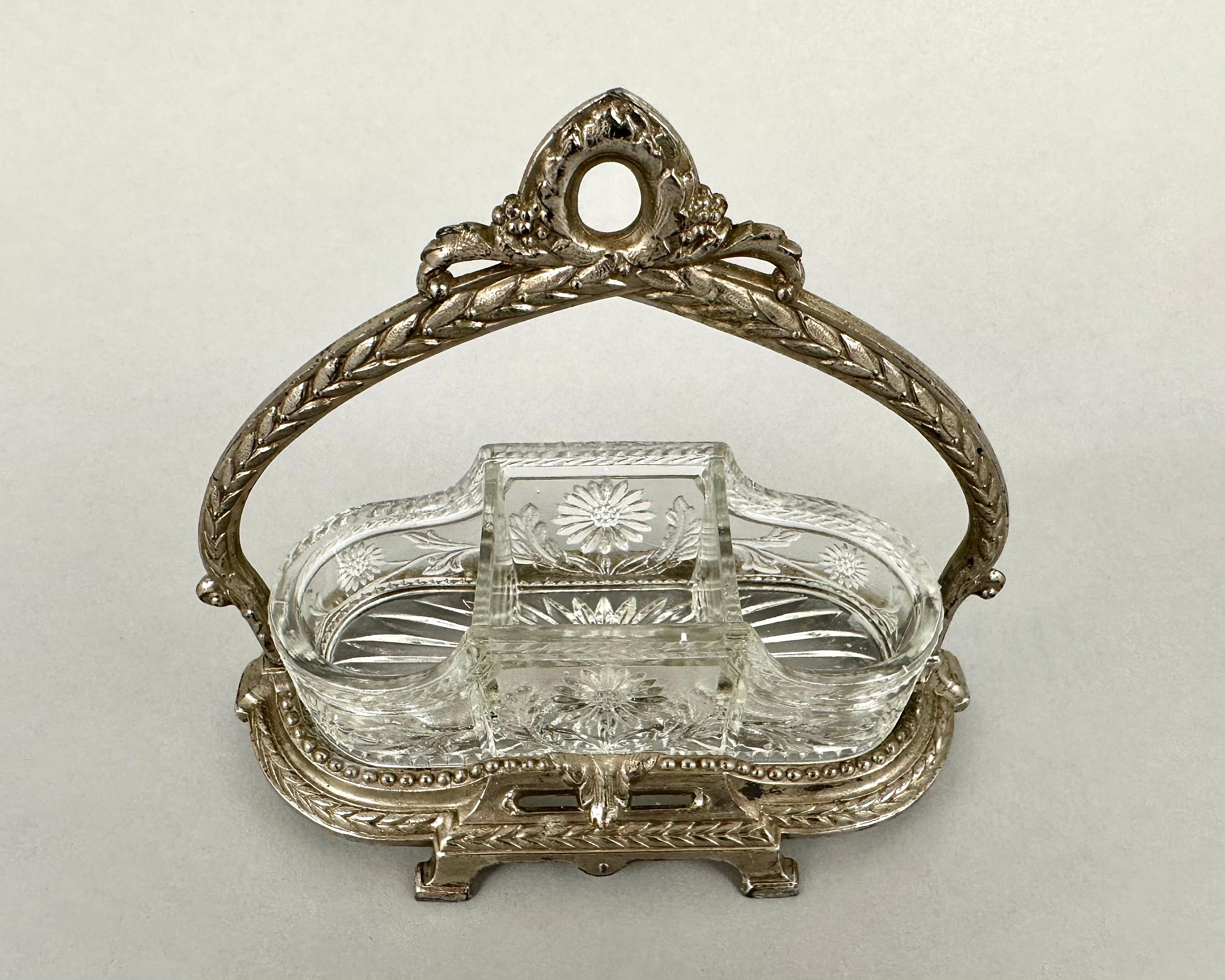 A beautiful antique condiment dish or serving dish.

Made from silver and cut glass in France and dating from circa 1910s.

Condiment caddy set on a silver and glass stand is an excellent solution for convenient and stylish storage of salt and