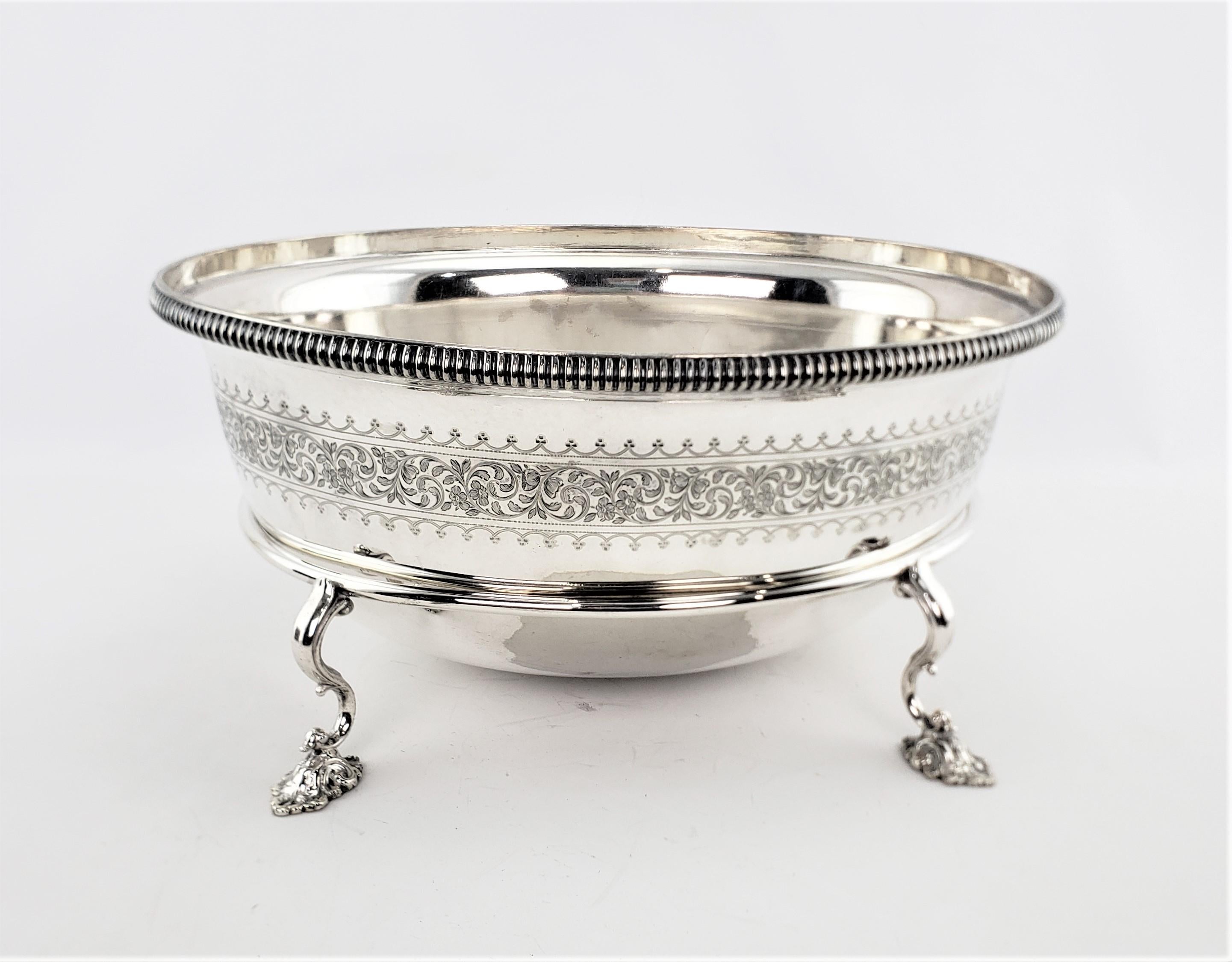 This extremely large and substantial ice trough or centerpiece is a marriage of an inverted meat dome with a silver plated stand. The meat dome has no maker's mark, but presumed to have been made in England in circa 1890. The handle of the dome has