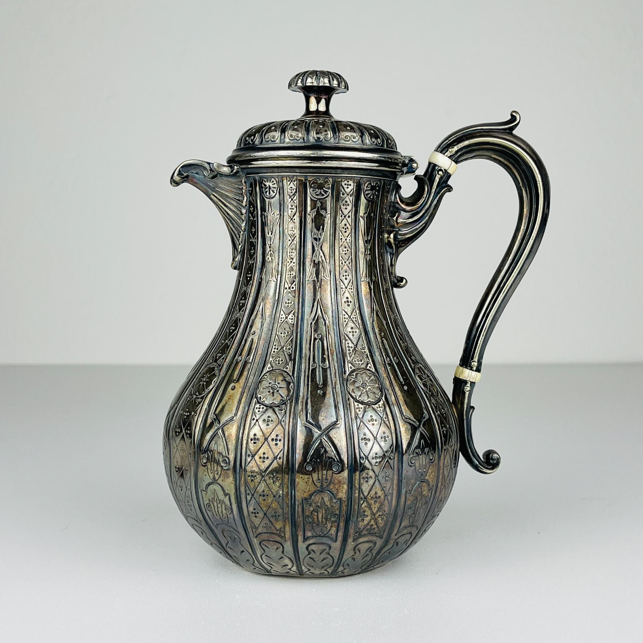 Antique silver plated creamer by Elkington & Co made in the United Kingdom in the 1880s.

Elkington & Co are one of the most important names in English Silver and Silver Plate. Elkington started in Birmingham in 1836, and experimented with