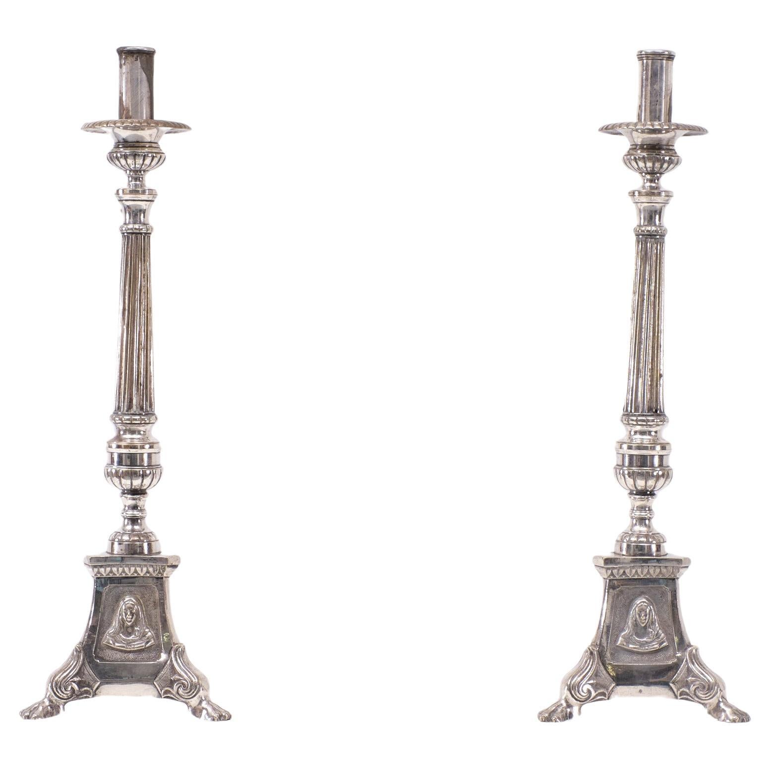 Very nice pair of Silver Plated Church candle sticks .France 1850s 
Triangle shaped base .  with Three saints Jesus Maria and Josef..
normal wear and tear after 150 years .
 