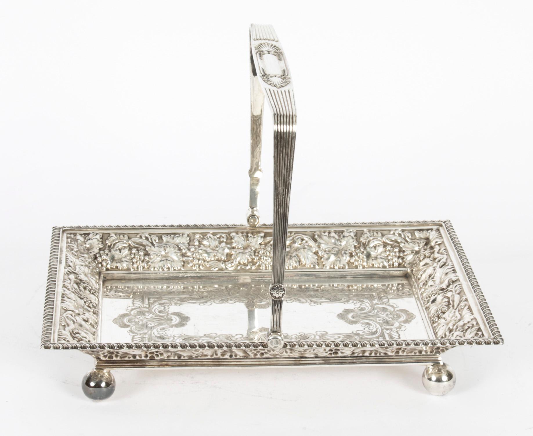 This is a stunning English Victorian silver plated fruit or bread basket by Roberts & Belk, circa 1880 in date.

The rectangular shaped body features a embossed grape vine with foliate and floral and decoration boarder, the center has fabulous