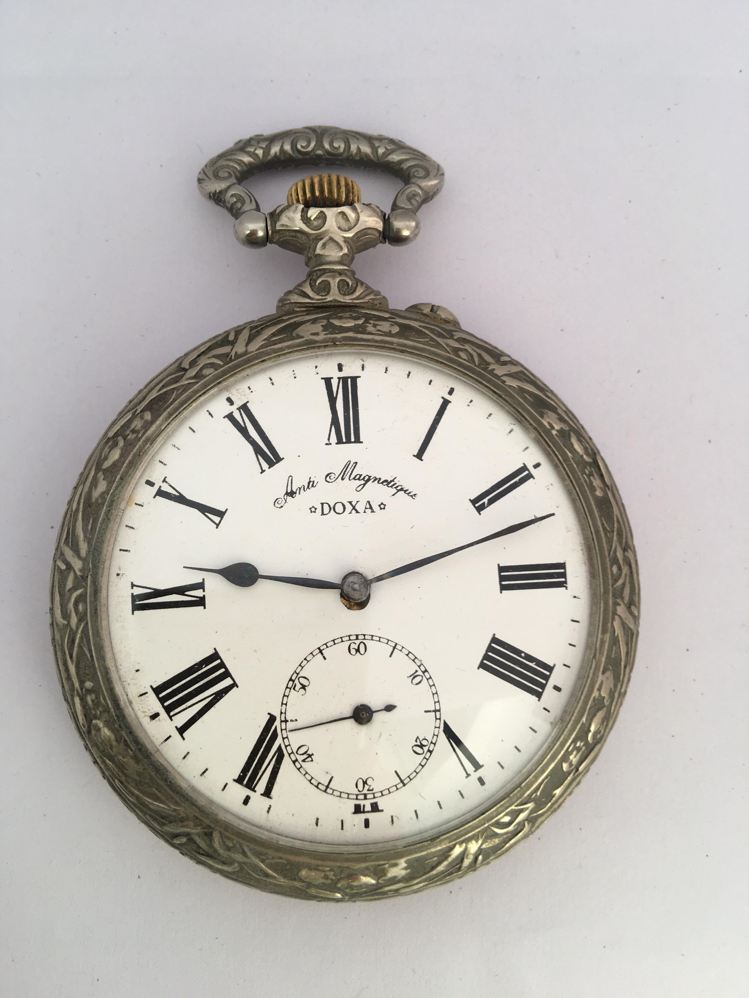This beautiful antique bigger size 70mm diameter hand winding silver plated pocket watch is in good working condition and it is running well (It keeps a good time). It is fully engraved case depicting a “Fisherman” . Visible signs of ageing and wear