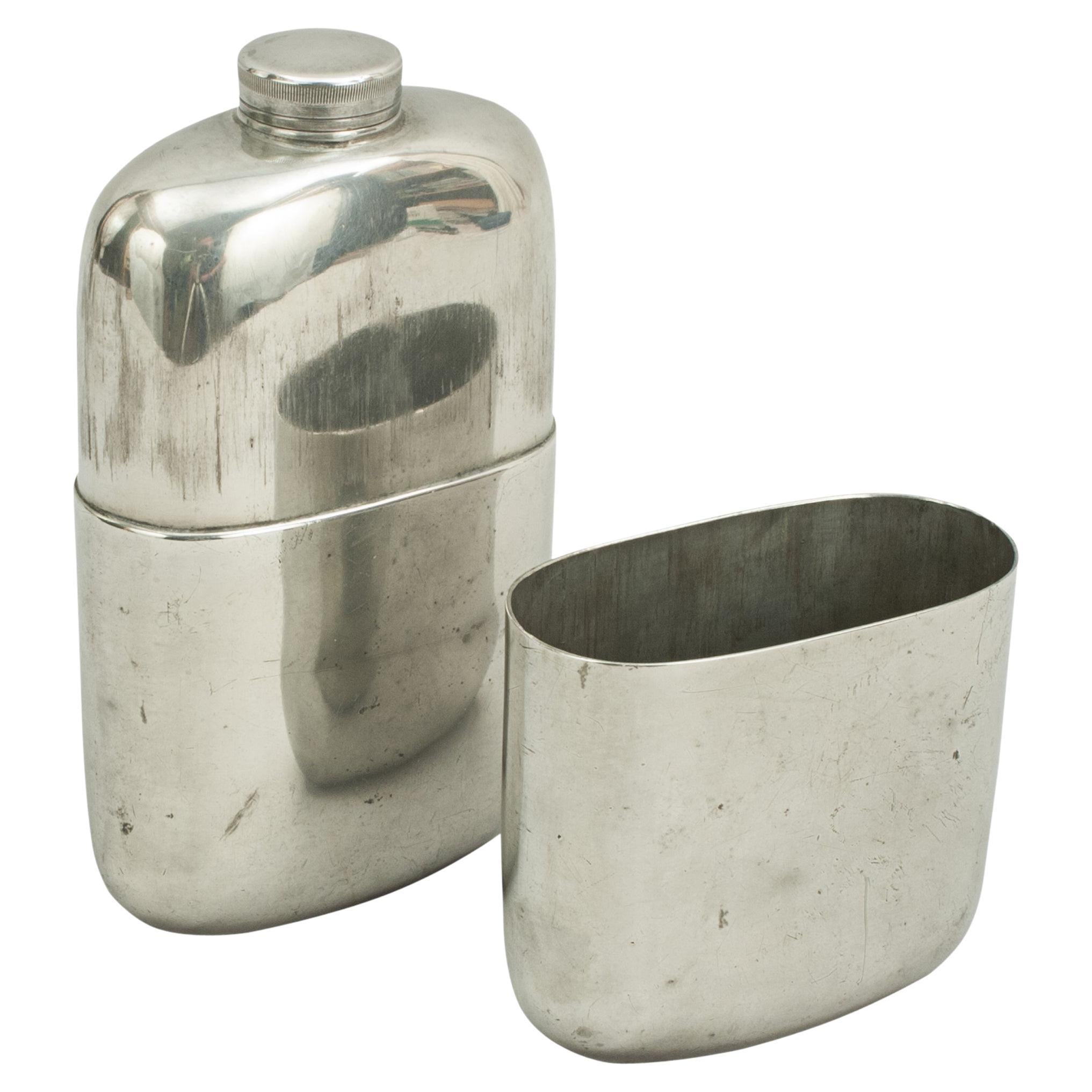 Large Leather Covered Glass Hip Flask with Silver Plated Top, circa