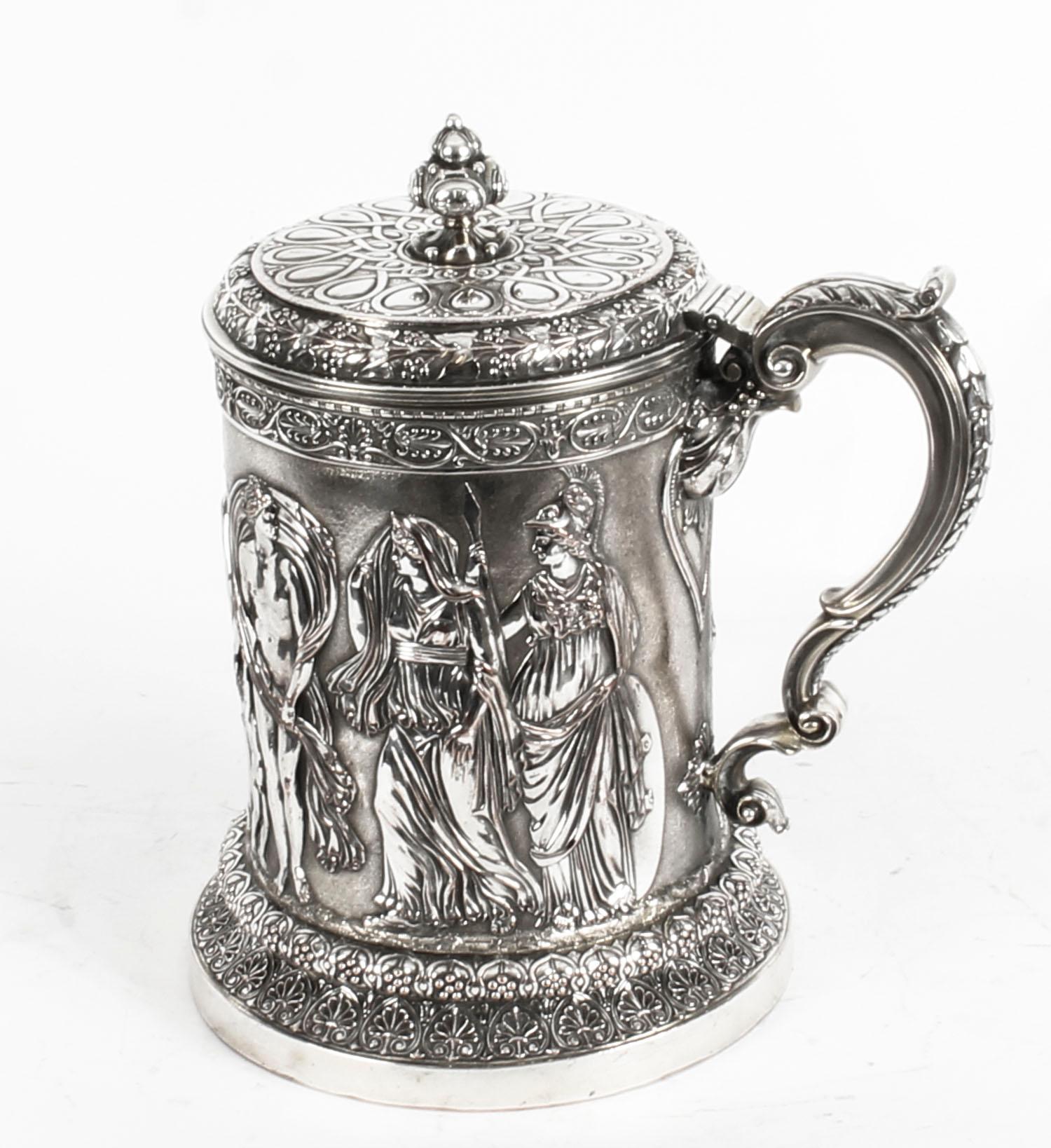 A fabulous monumental antique silver plated lidded tankard, by the renowned silversmiths, Elkington, circa 1860 in date.

Of fabulous quality, made of silver on copper, with wonderful embossed and engraved decoration depicting various Greek Gods,