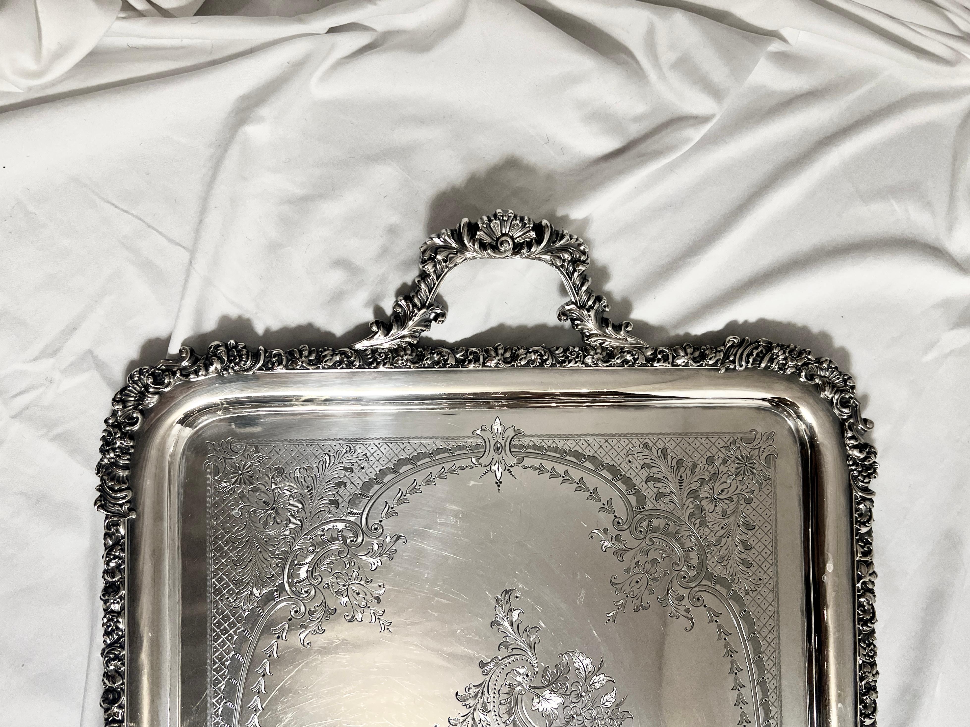 Antique exceptional quality silver plated service tray, circa 1885-1895.
With diamond engraving and rolled edge on tray.