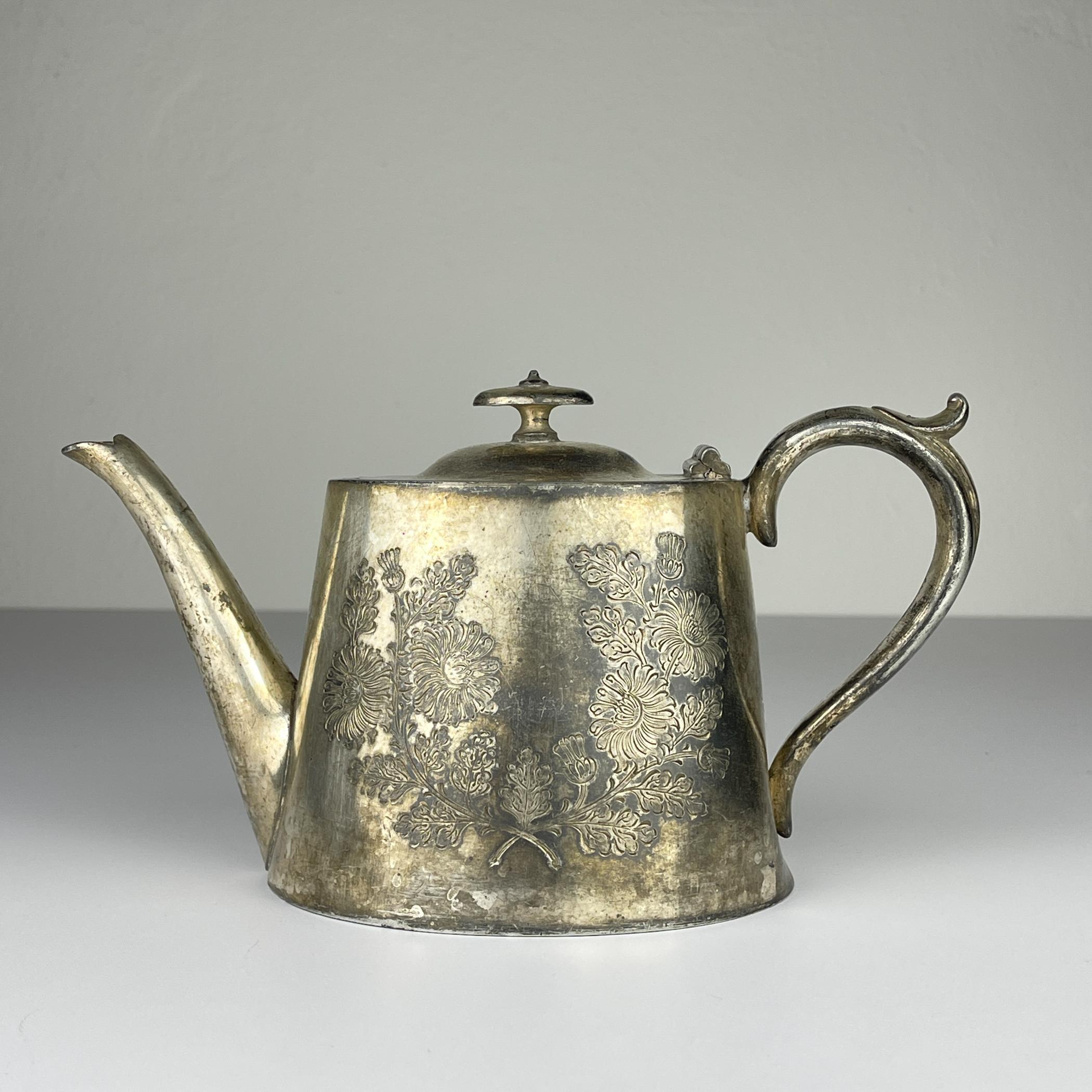 Antique silver plated teapot made in Sheffield, England in the 1890-1910s.
Silver plated is used to denote - the method was invented in the city of Sheffield in about 1743 by goldsmith Thomas Boulsover.
Objects made with the metal obtained by hot