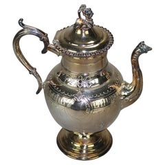 Antigua tetera plateada C1890