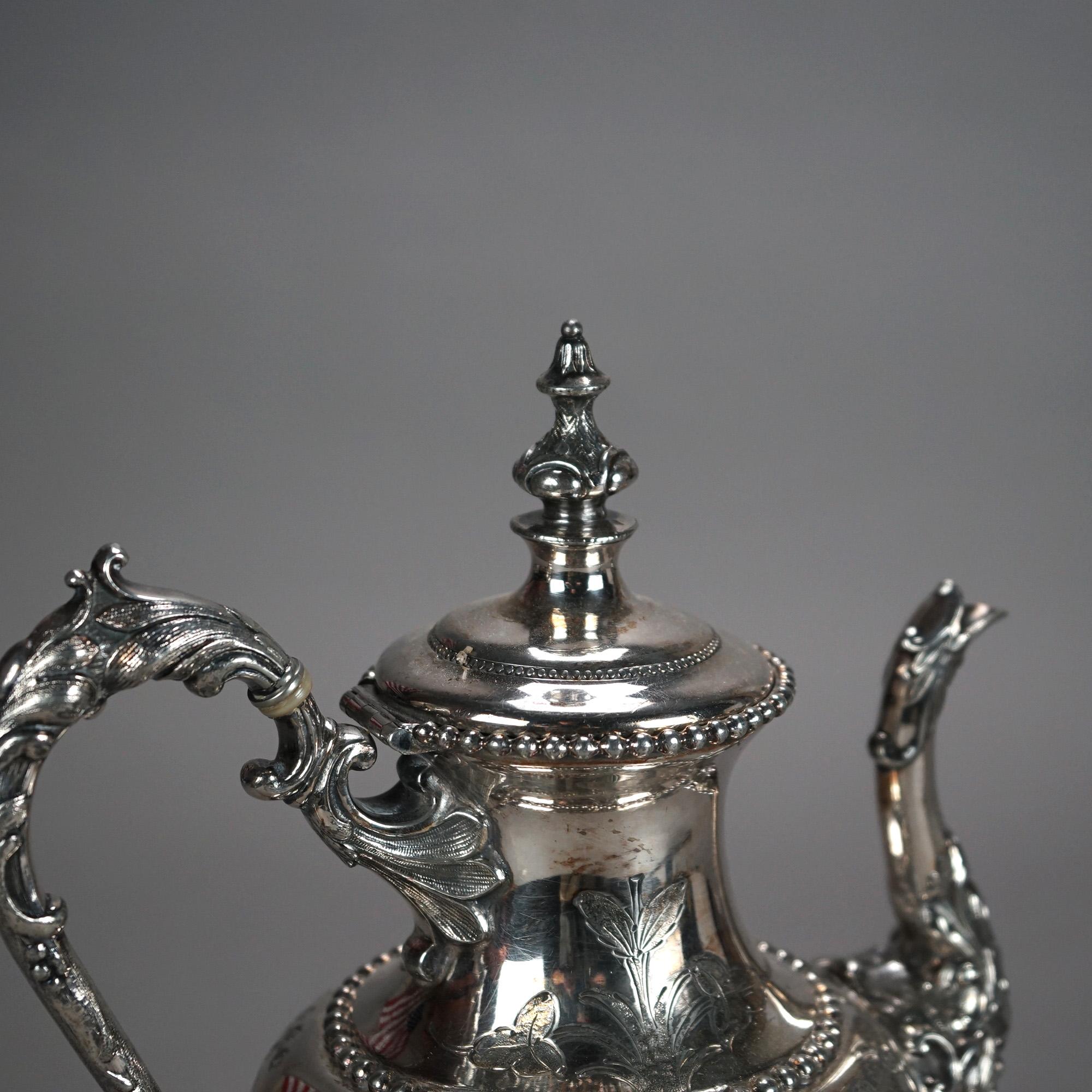 Antique Silver Plated Teapot with Foliate Engraving C1890

Measures - 12.25H x 8.75