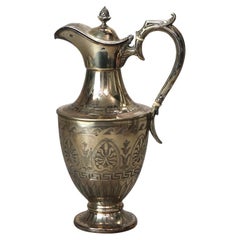 Antigua Tetera Plateada con Grabado Foliado C1890