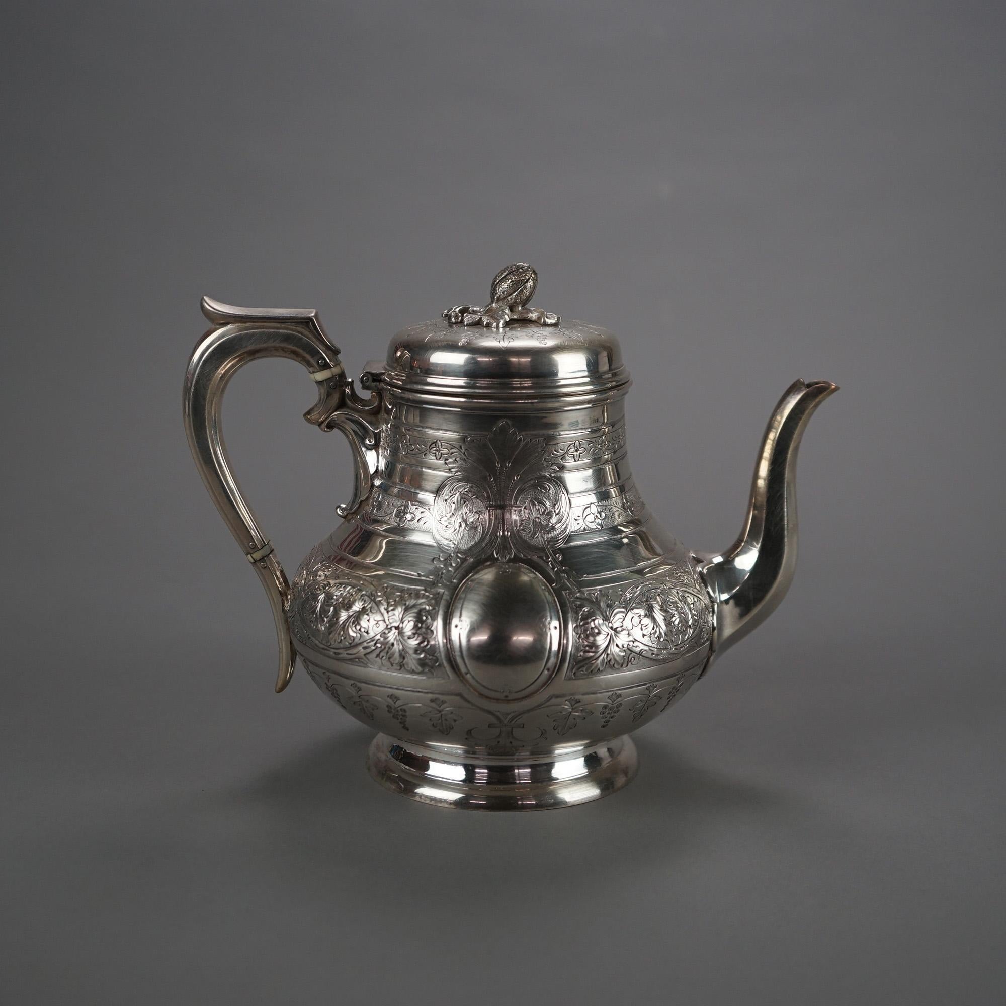 Tetera antigua plateada con remate foliado y grabado C1890 siglo XIX en venta
