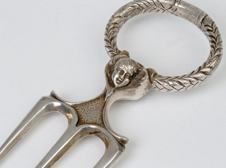 Antique Silver Plated Three Pronged Bread Fork with Angelic Heads For