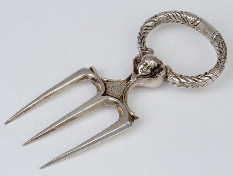 Antique Silver Plated Three Pronged Bread Fork with Angelic Heads For