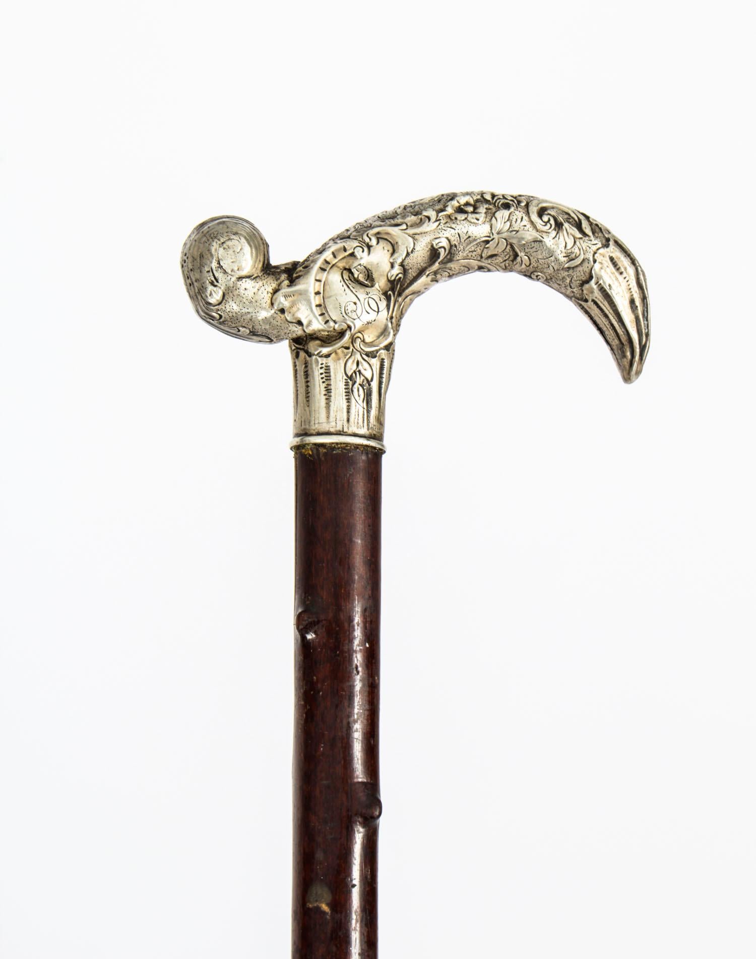 This is a beautiful antique Victorian silver plated handled walking stick circa 1890 in date.

It features a elaborately cast derby shape handle decorated with foliated and floral ornamentation. The sturdy Malacca tapering textured shaft features