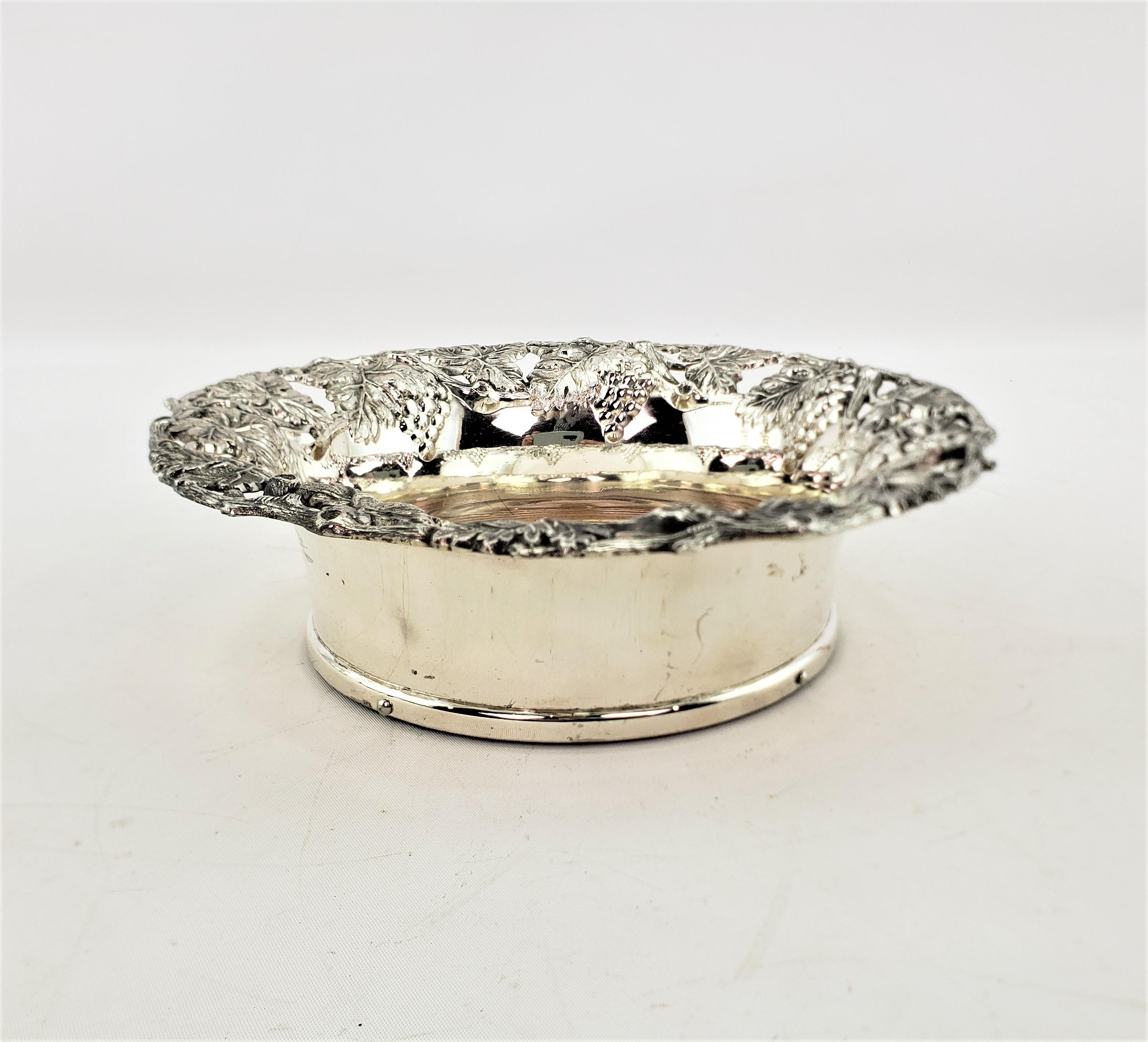20th Century Antique Silver Plated Wine Bottle Coaster with Grape & Leaf Decoration For Sale