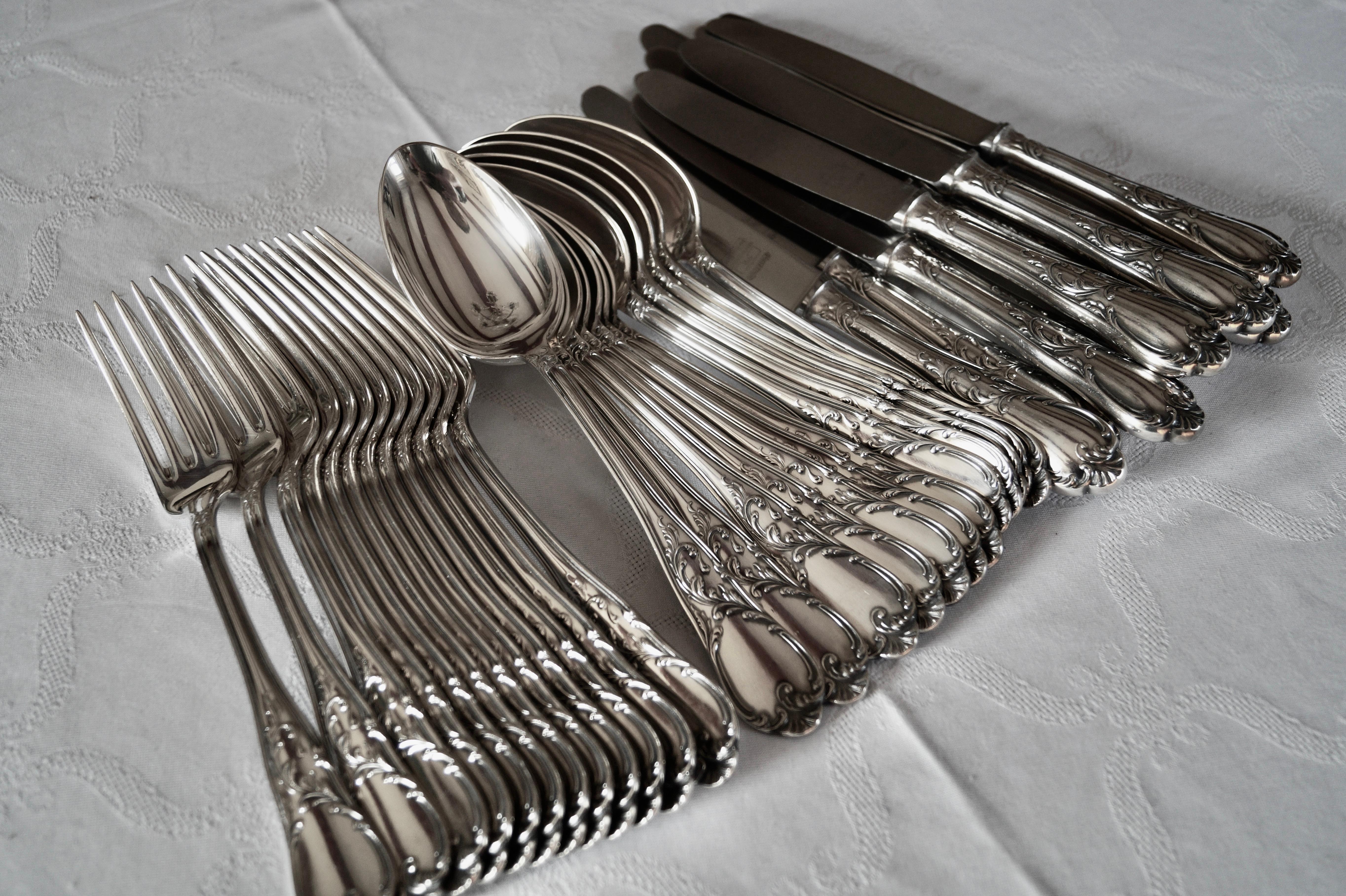 Beautiful antique high quality silver-plated cutlery set from the famous Belgium silversmith 