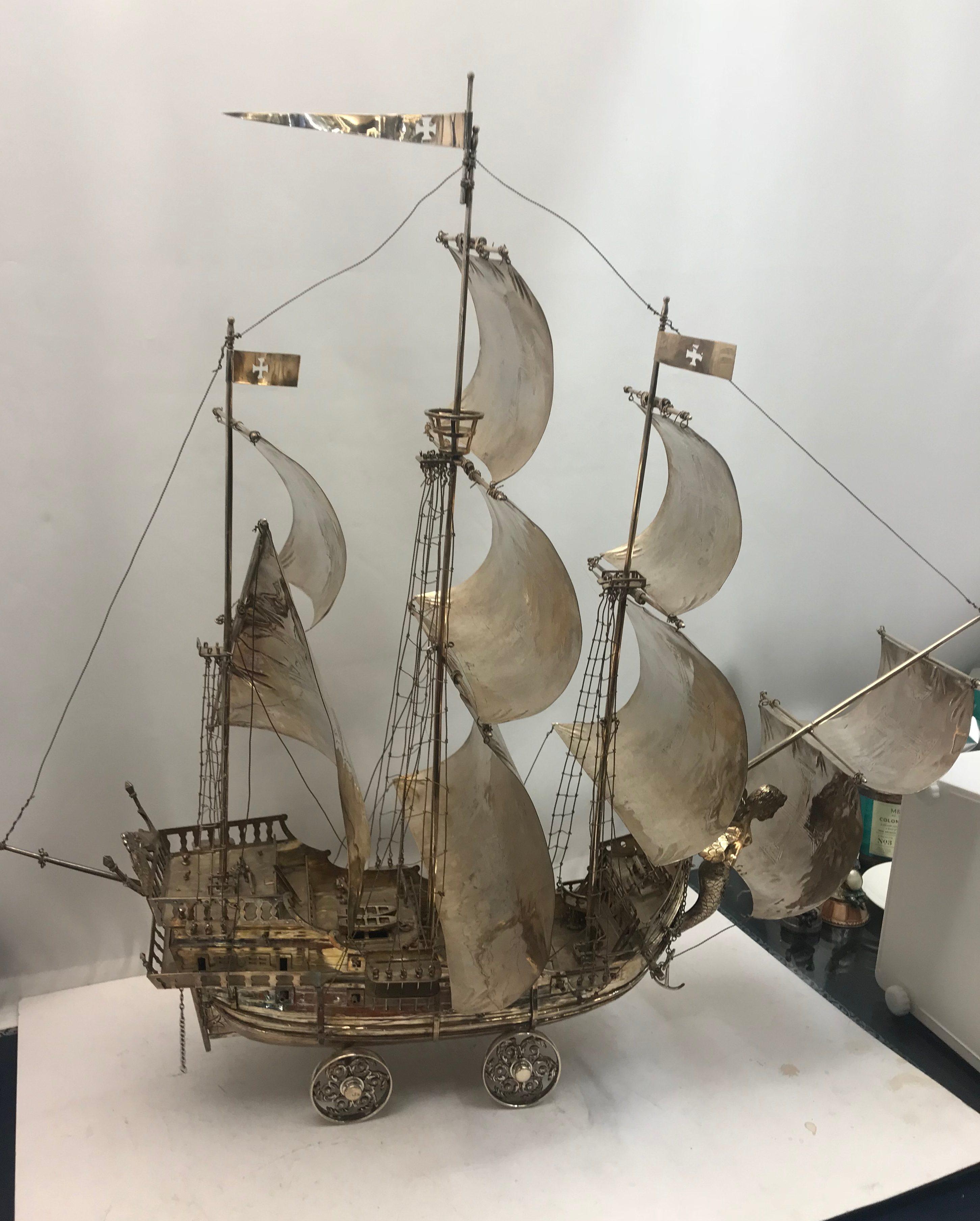 An incredible very large silver Nef ship, made in Portugal. 

Intricate detailing.
 