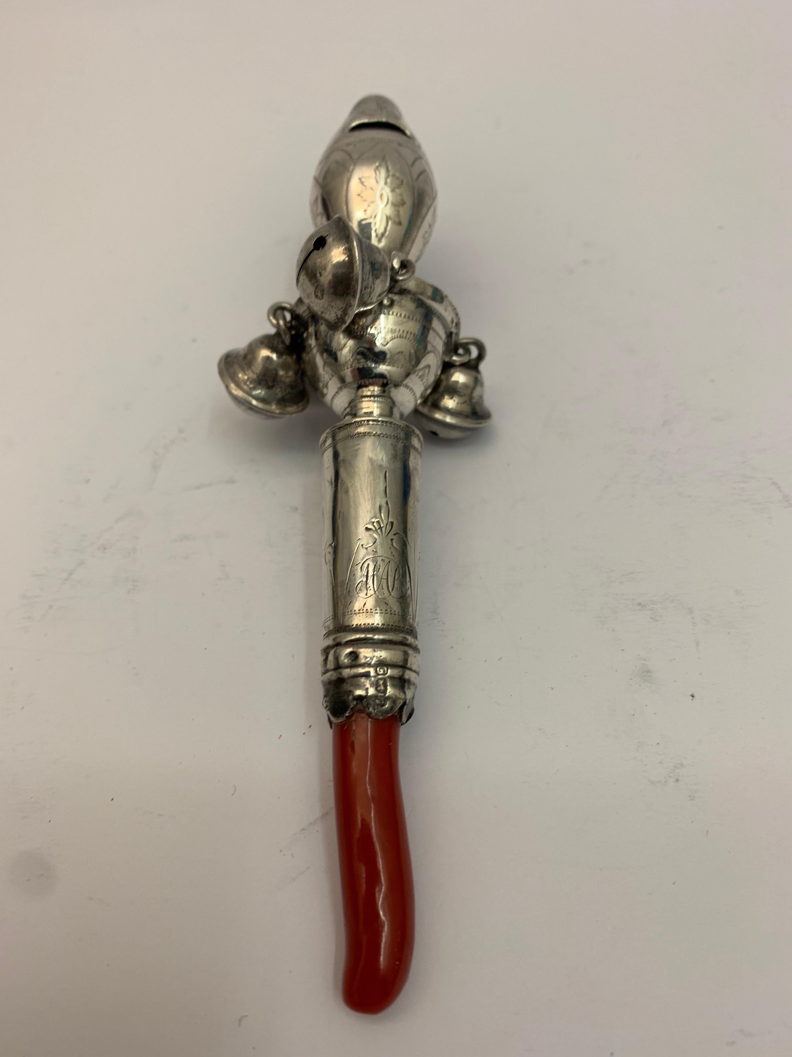 Antique silver rattle, complete with 4 bells and whistle, made by Peter and Ann Bateman.