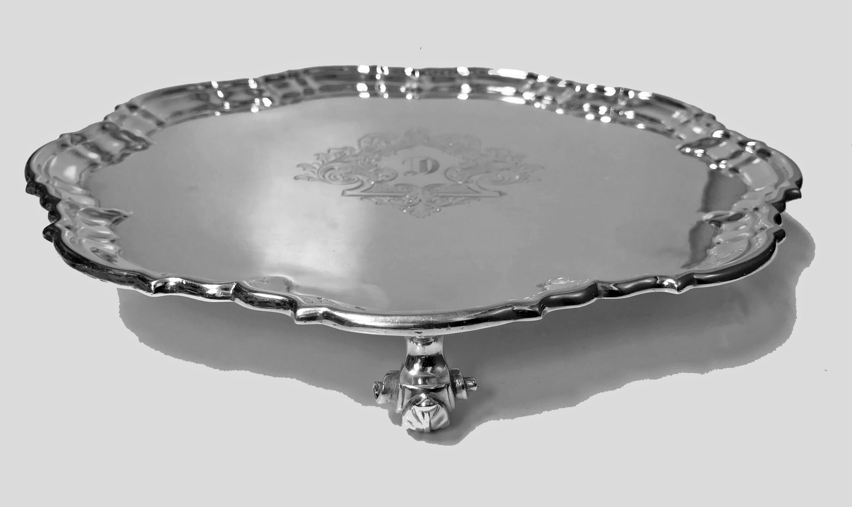 Antique silver salver, London 1892 Edward Hutton William Hutton and Sons. The George 11 style Salver on three acanthus ball supports, circular shape and moulded border, engraved central cartouche with initial C. Diameter: 10.25 inches. Weight: 23.75