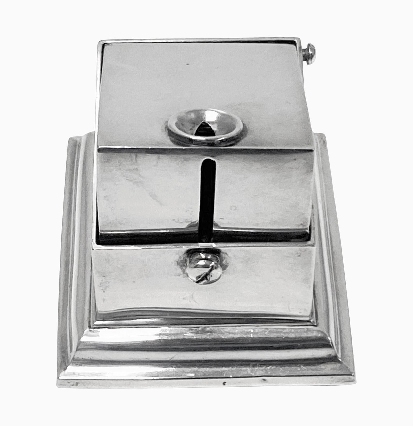 Antique Silver Table or Desk Cigar Cutter London 1903 W. H. Webber. Adjustable screw to allow access to cigar clippings. Cutting mechanism activated when pressed down from the top. Fully hallmarked. Measures: 3.5 x 3.0 x 2.25 inches.