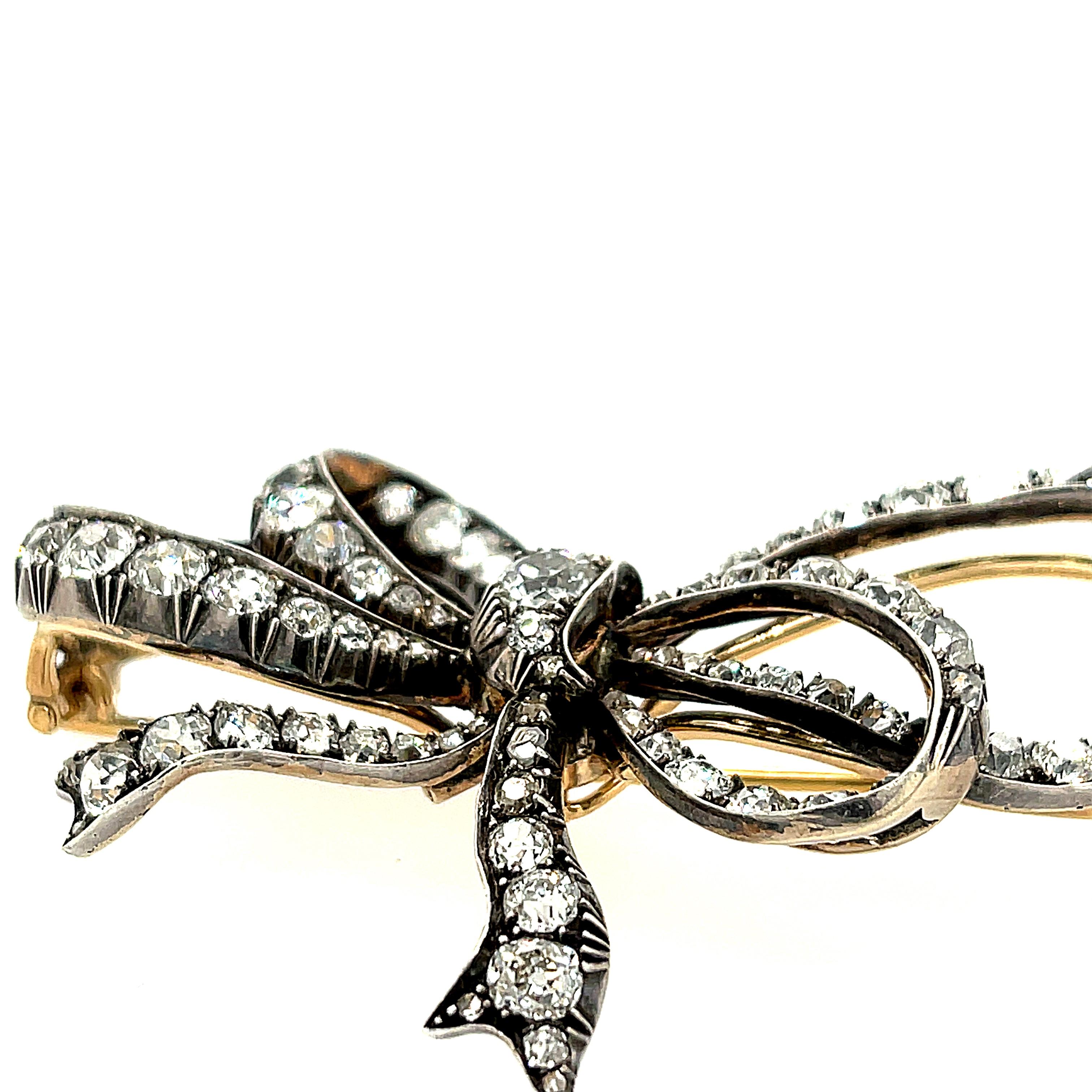 Antique Silver Topped Gold Old European Cut Diamond Bow Brooch In Good Condition In New York, NY