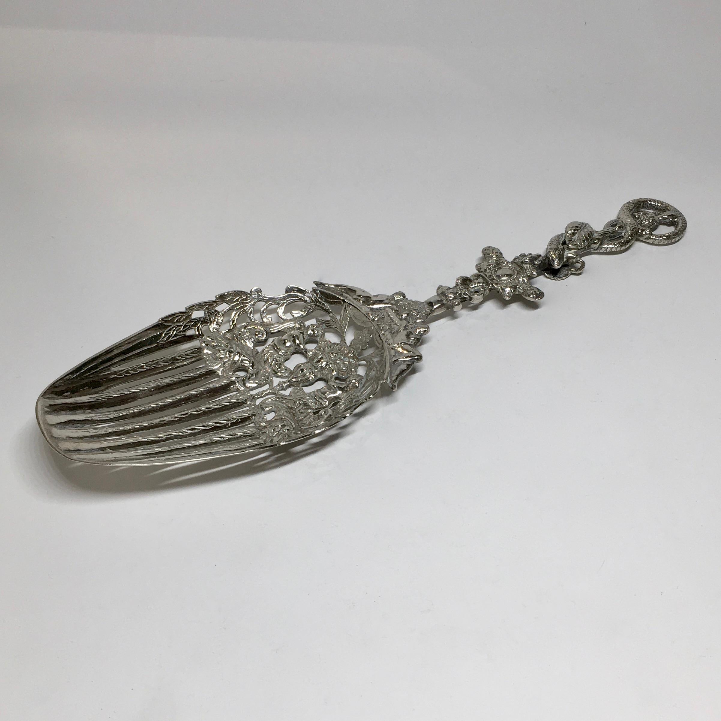 Antique Silver Wet Fruit Scoop, 1895, floral design. Ajour container and stalk. 

A beautifully decorated wet fruit scoop. Your attention to the beautiful details. At the time, these silver objects were cast in various parts and then assembled.
The