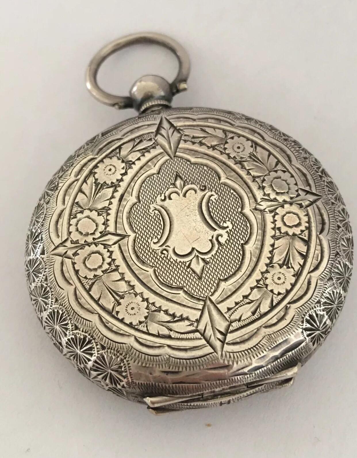 
Antique Silver with pink Enamel & gold Enlaid Dial Pocket Watch.


This beautiful key-wind pocket watch is in good working condition and is ticking well. It comes with a key.