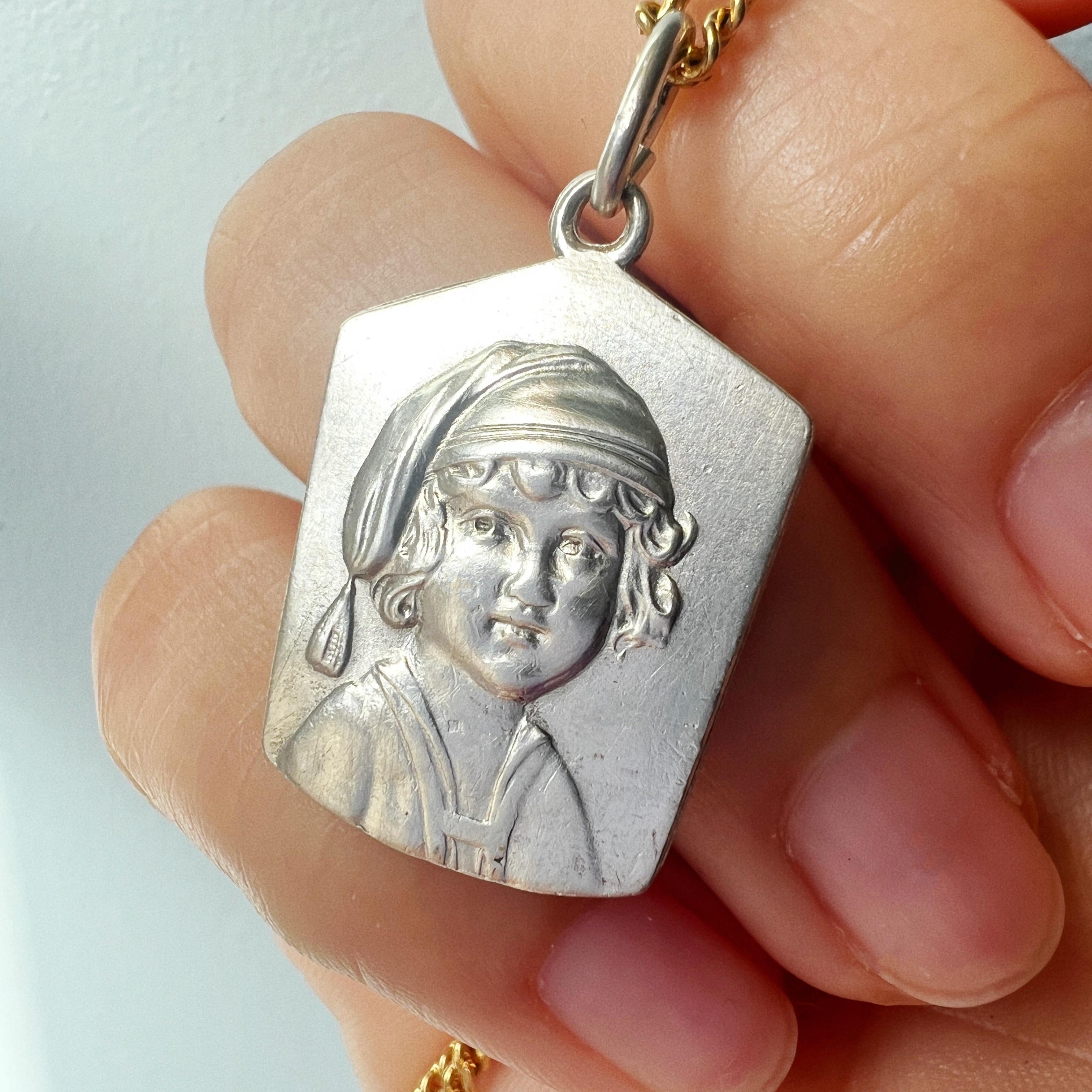 Women's or Men's Antique silver young child portrait pendant