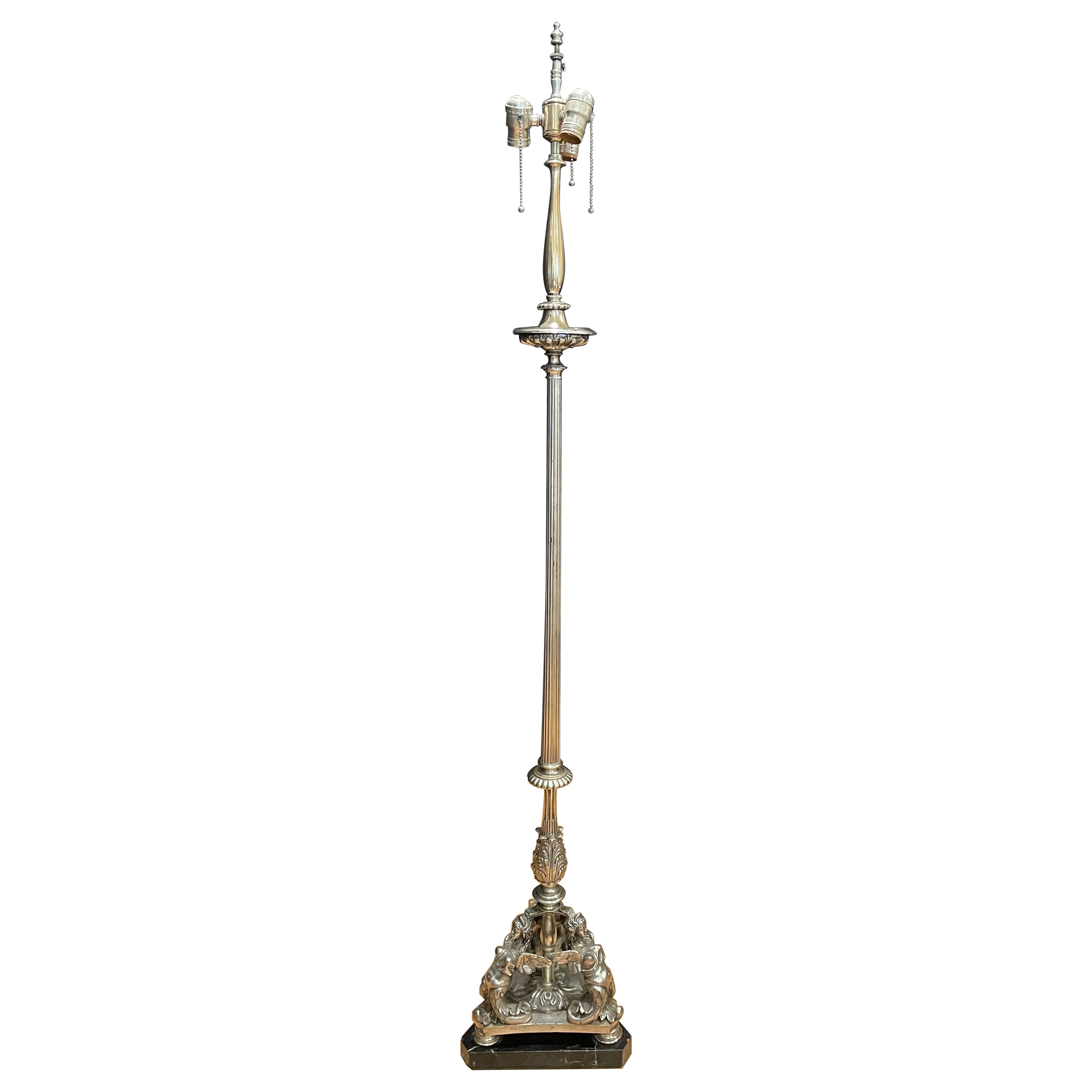 Lampada da terra barocca figurata in bronzo argentato antico
